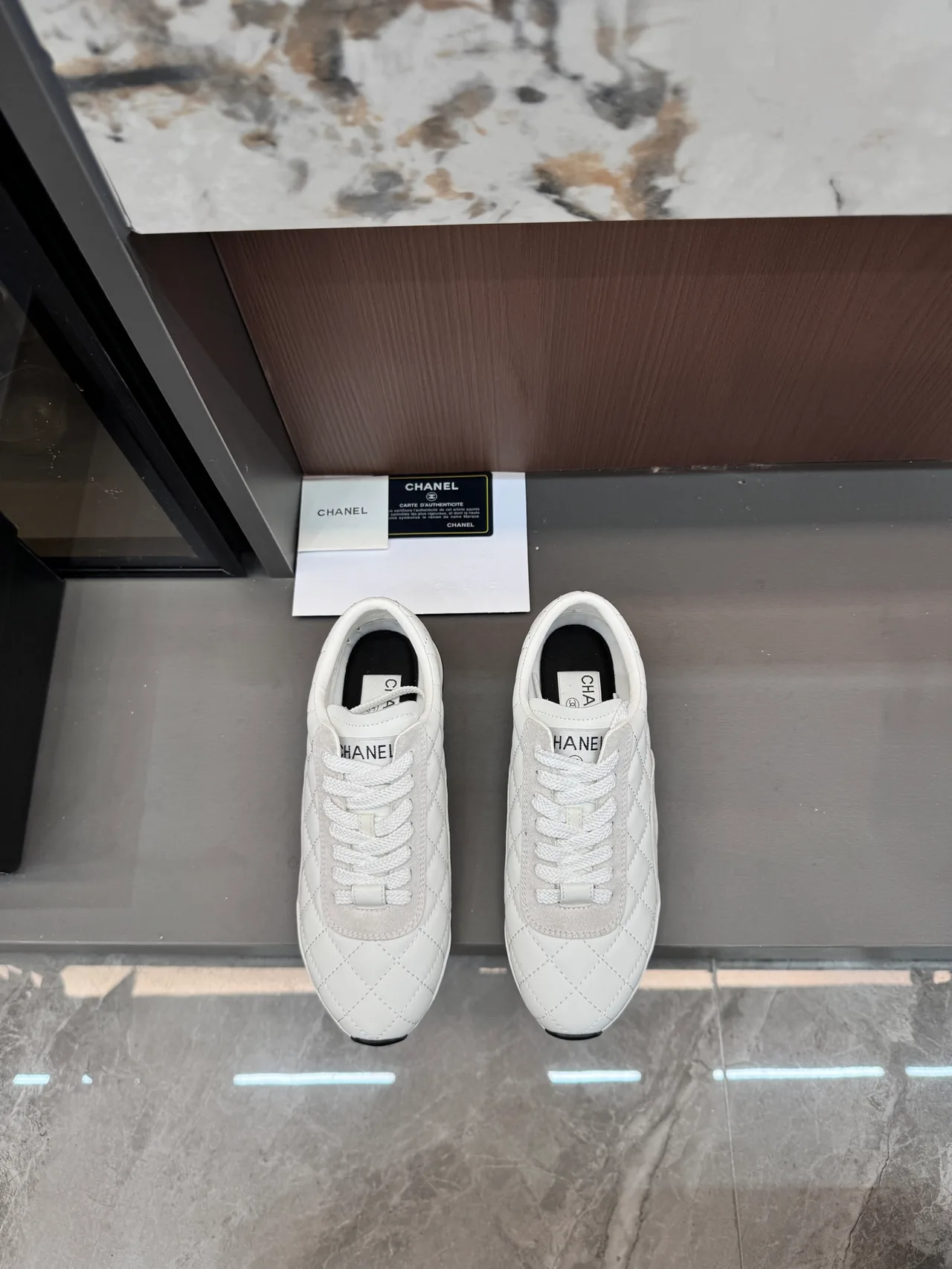 Chanel Quilted Glossy Sneakers in White · view 4