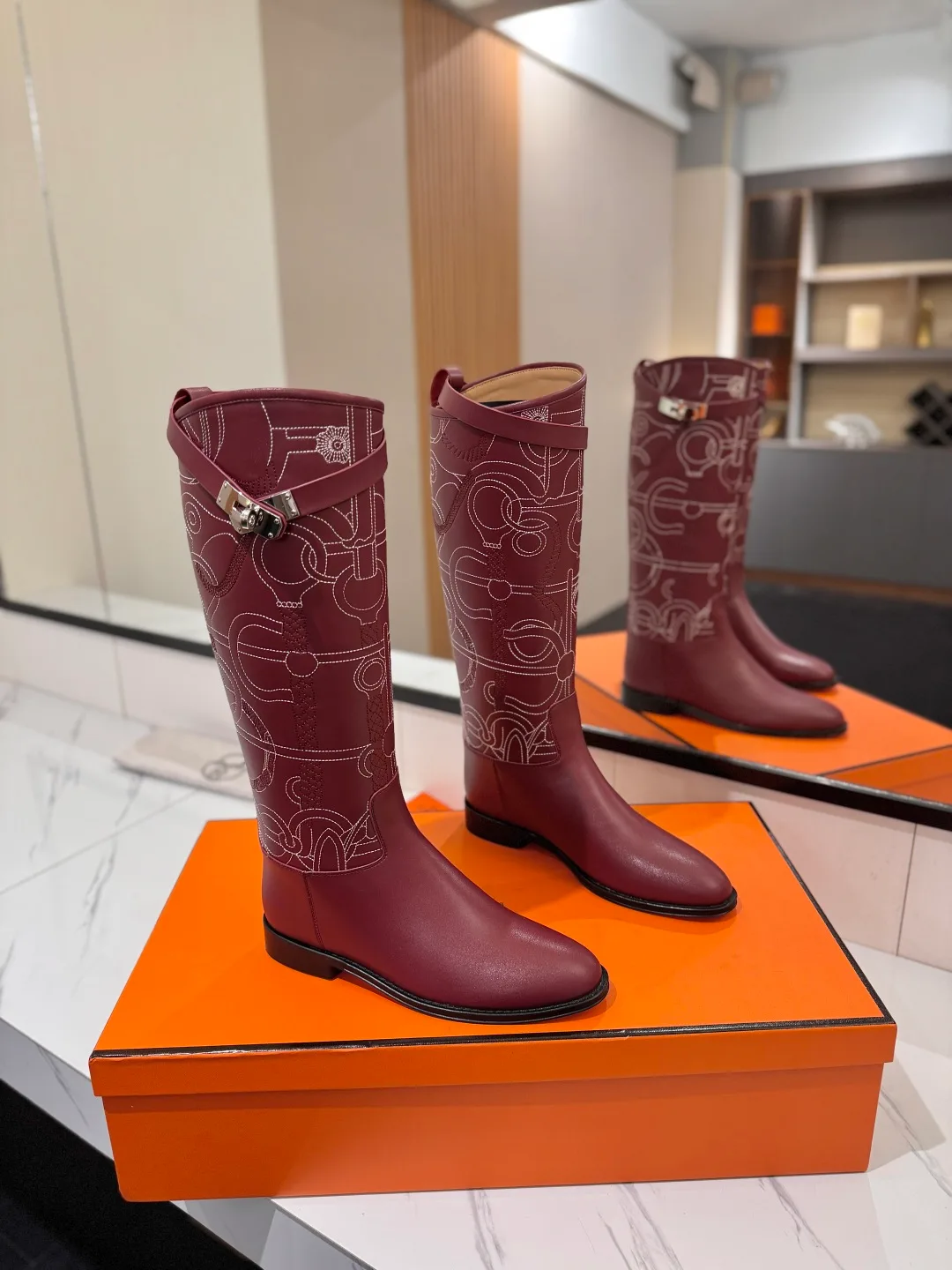 Hermes Cowhide Boots in Burgundy · view 1