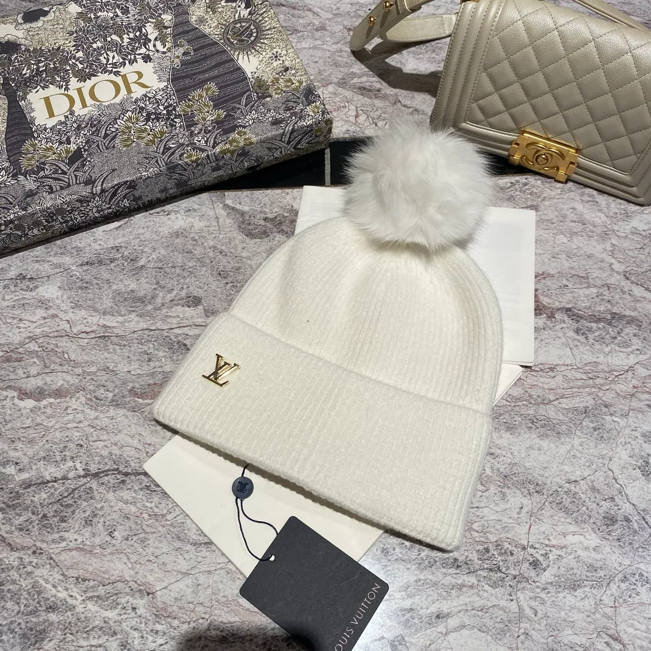 Louis Vuitton Pom-Pom Beanie in Black & White & Blue & Pink & Beige & Grey & Cream & Burgundy & Red & Tan · view 2