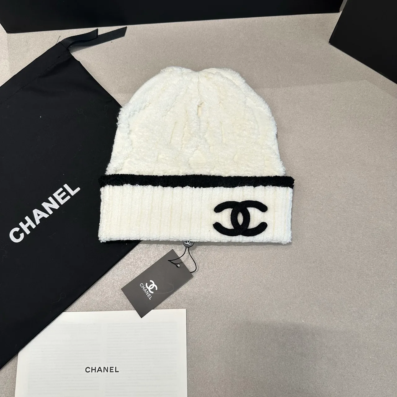 Chanel CC cable knit beanie in Black & White · view 2