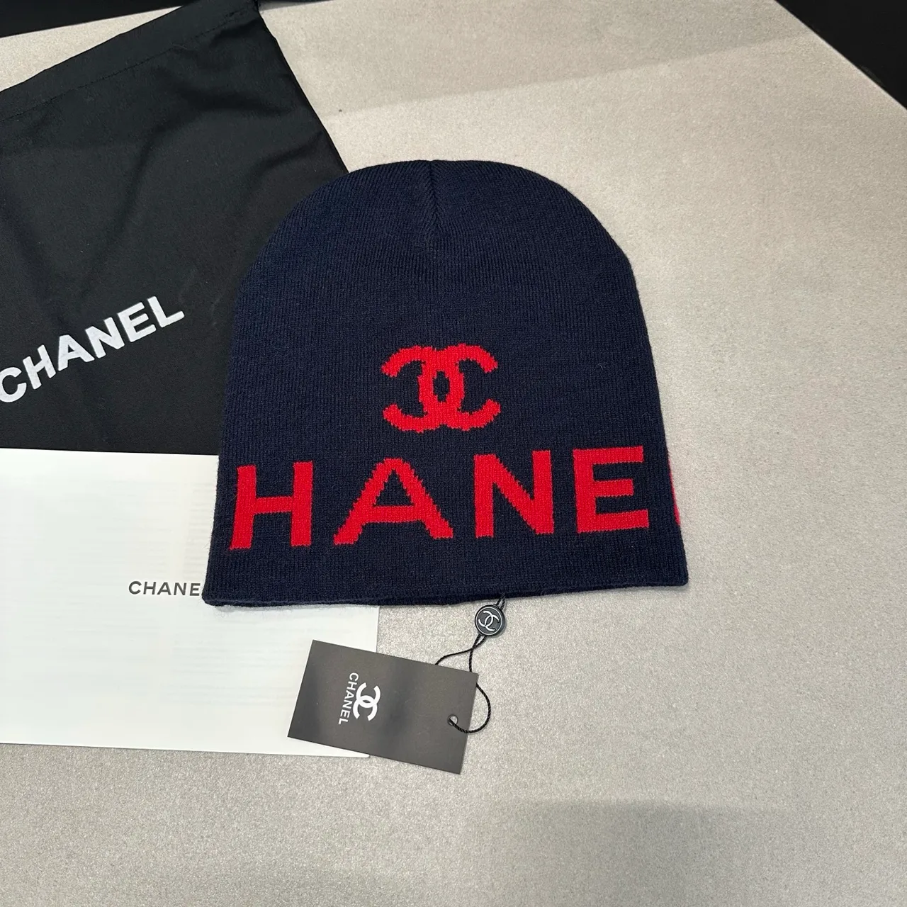 Chanel Logo knit beanie in Blue & Black · view 1