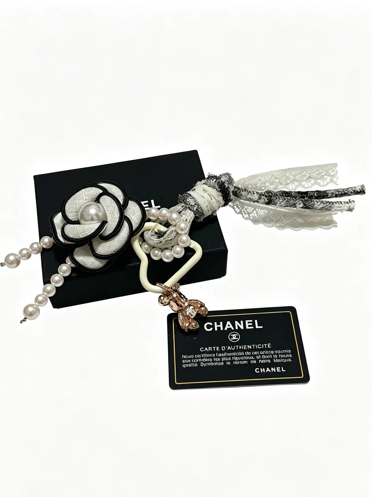 Chanel Glossy Camellia Key Charm in White · view 2