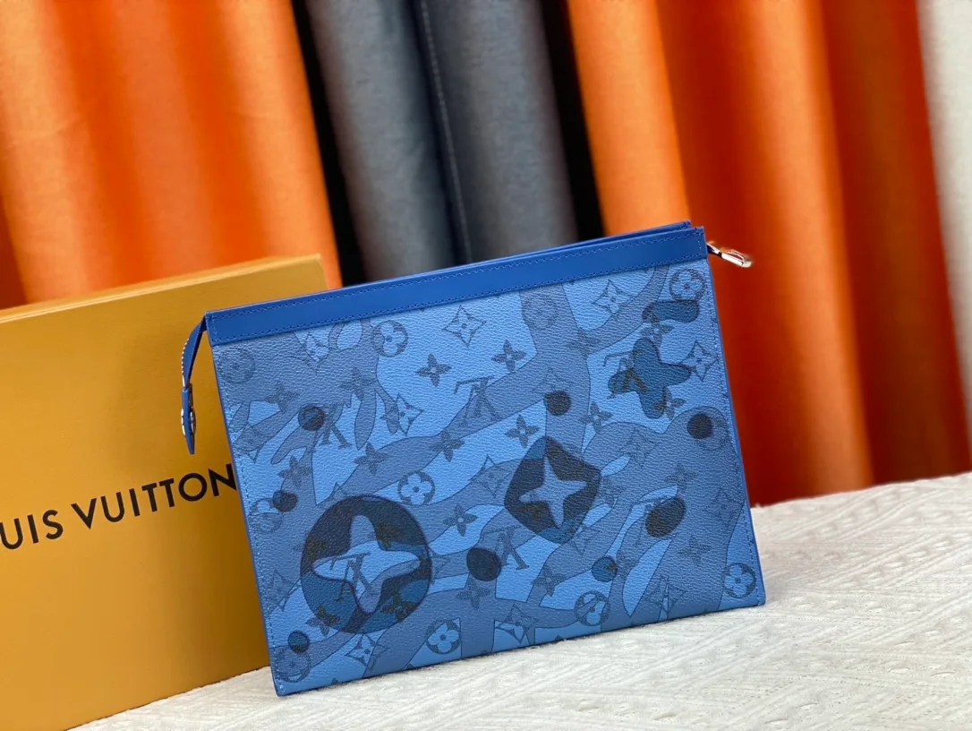 Louis Vuitton Cowhide Canvas Clutch in Blue · view 3