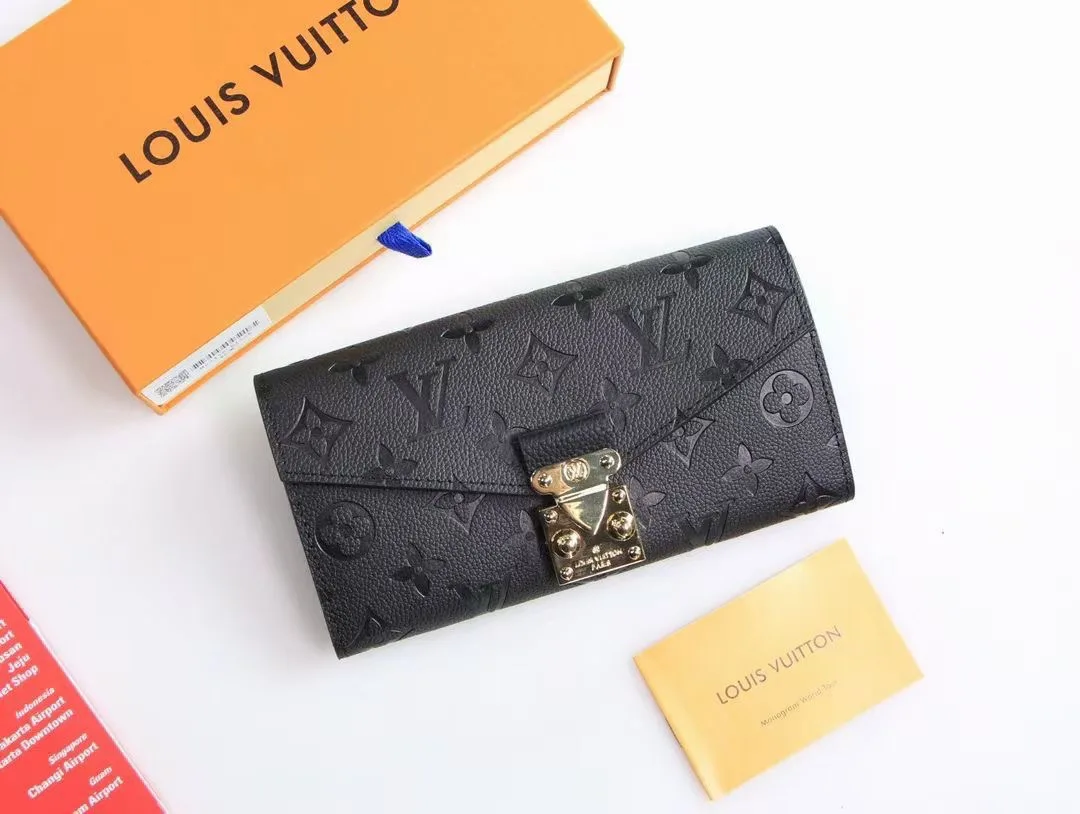 Louis Vuitton Cowhide Long Wallet in Black · view 5