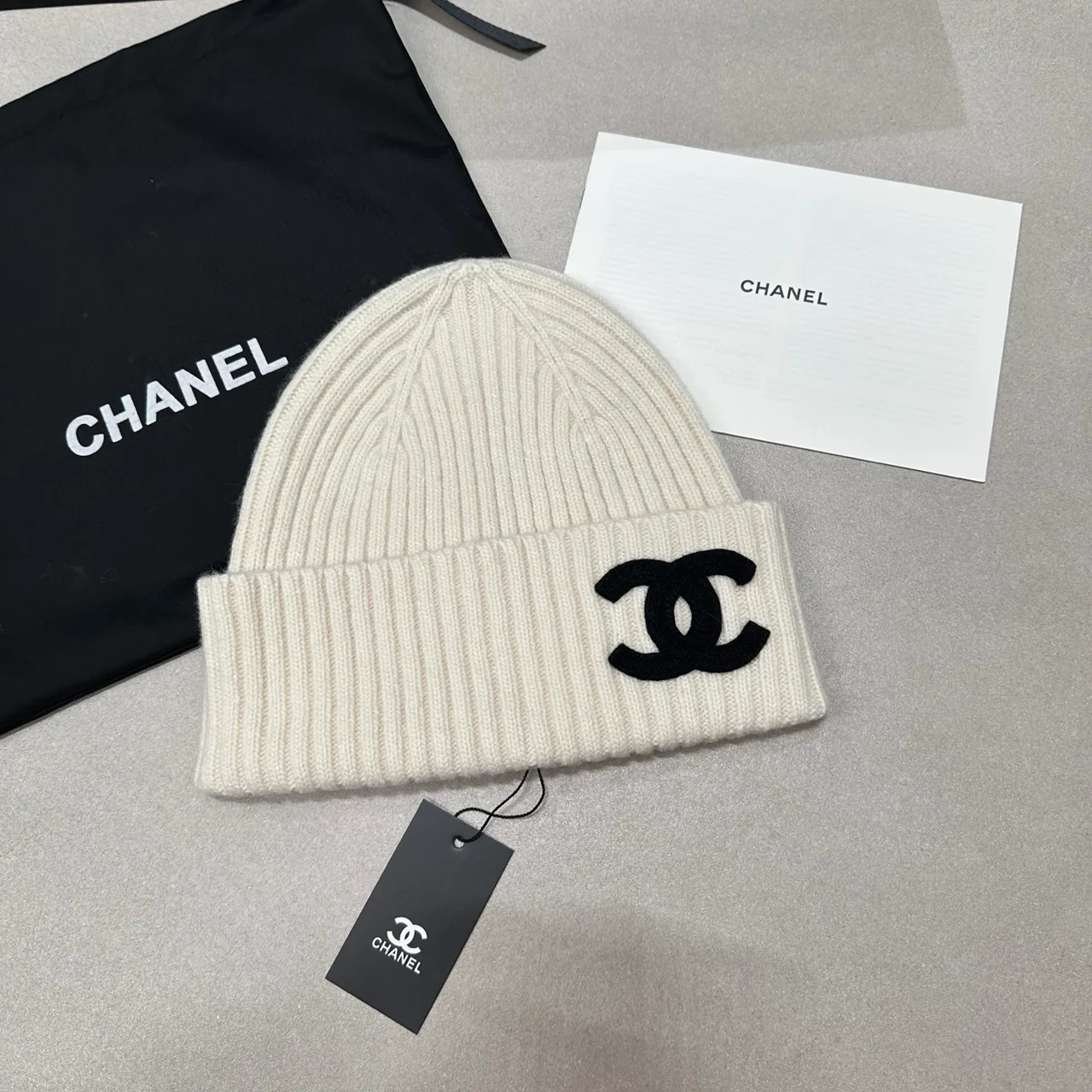 Chanel Knit Beanie in Cream & Black & Blue & Grey · view 1