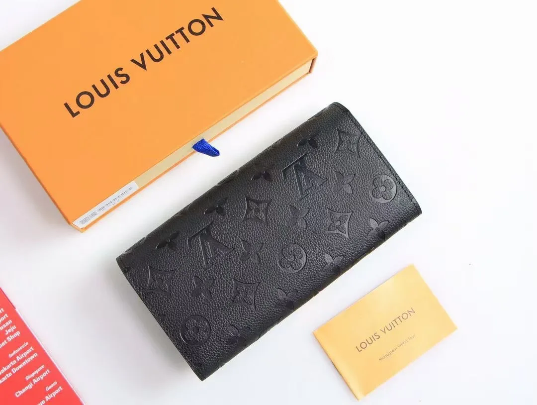 Louis Vuitton Cowhide Long Wallet in Black · view 8
