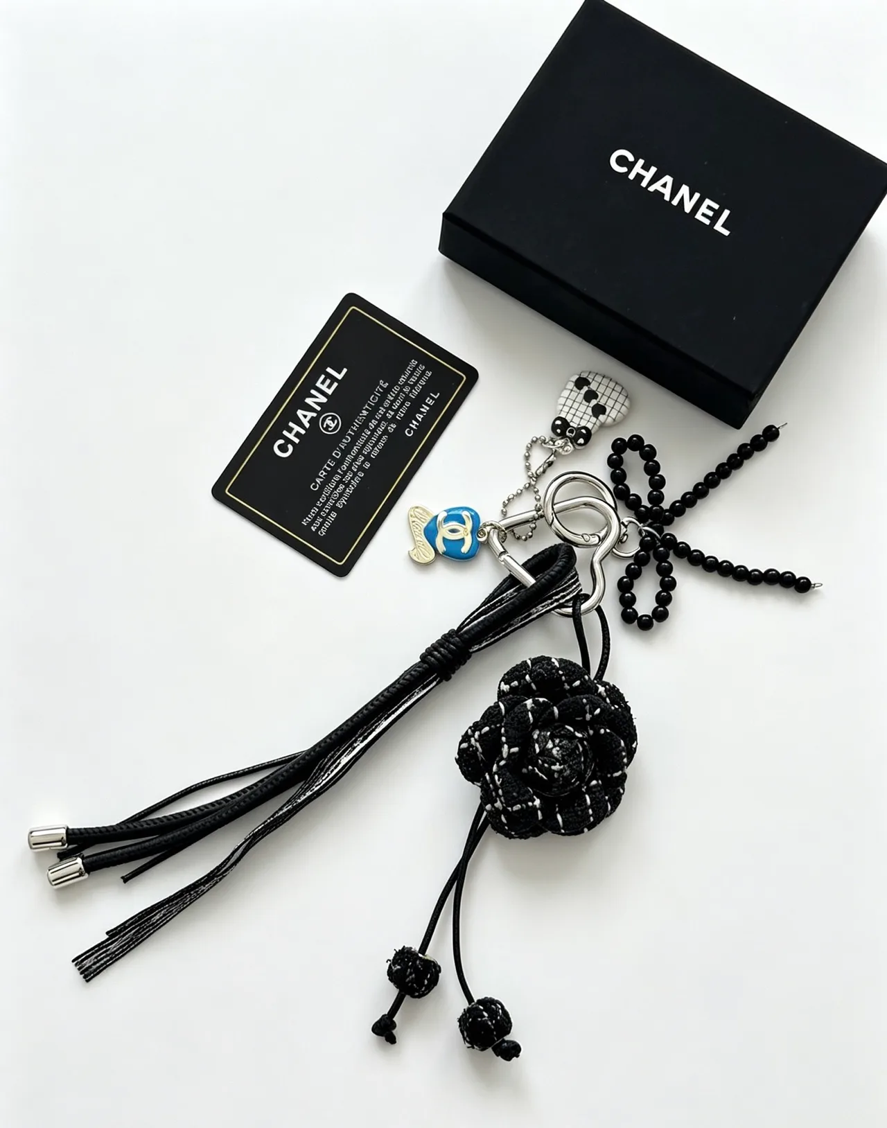 Chanel Woven Floral Tassel Keychain in Black · view 3