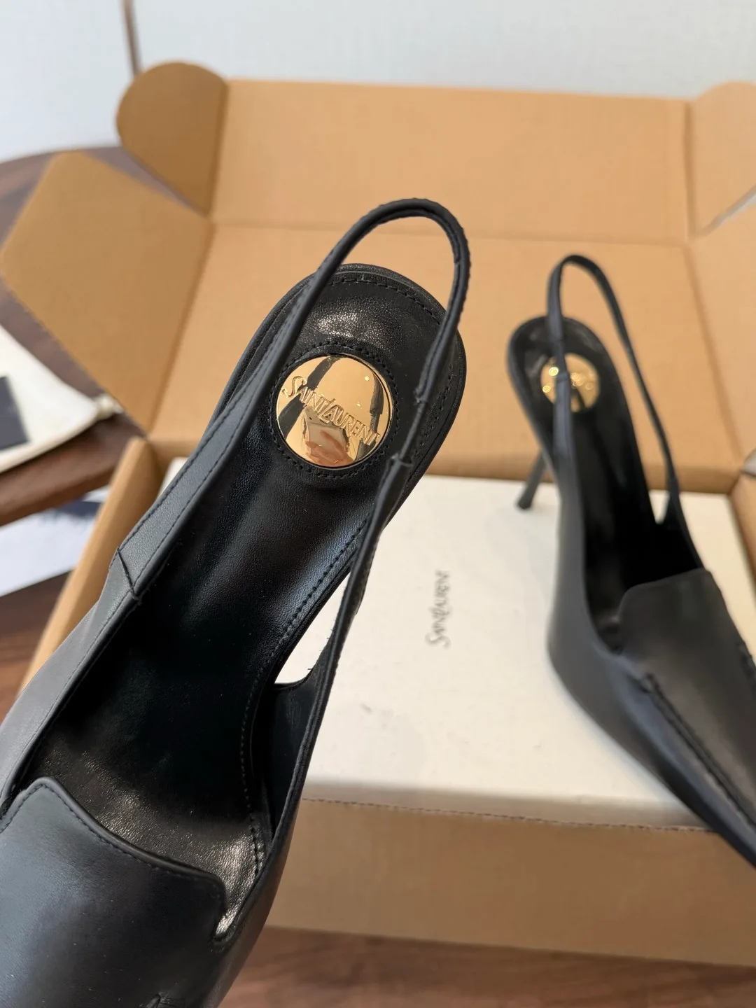 Saint Laurent Cowhide Slingback Heels in Black · view 7