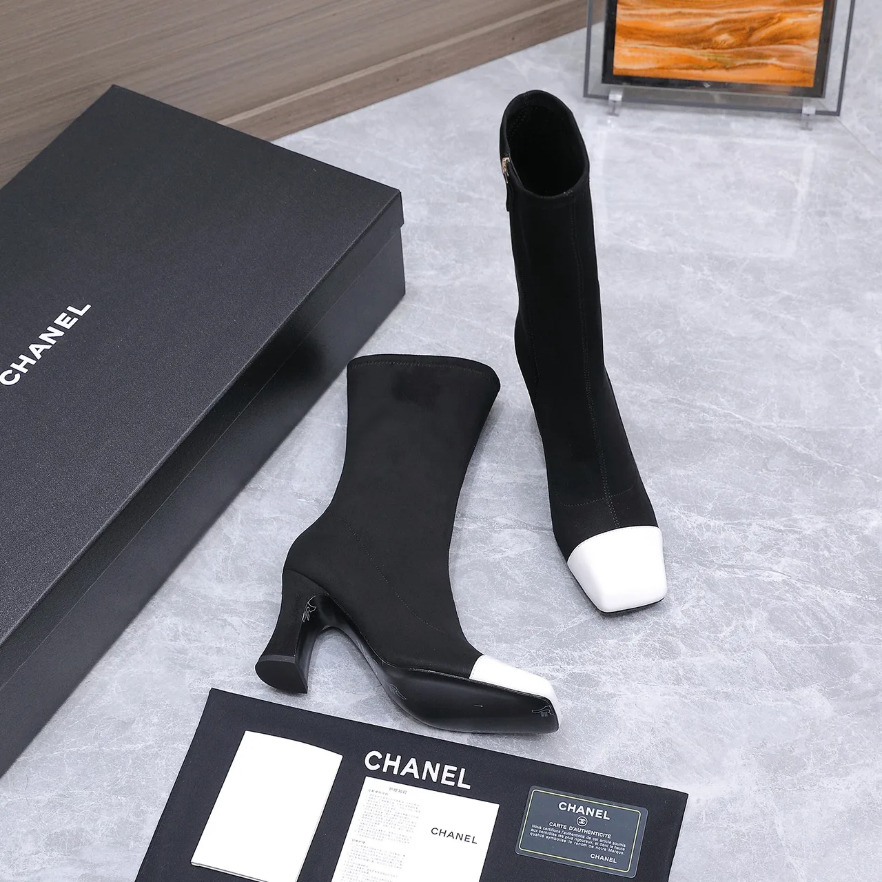 Chanel Cowhide Boots in Black · view 3