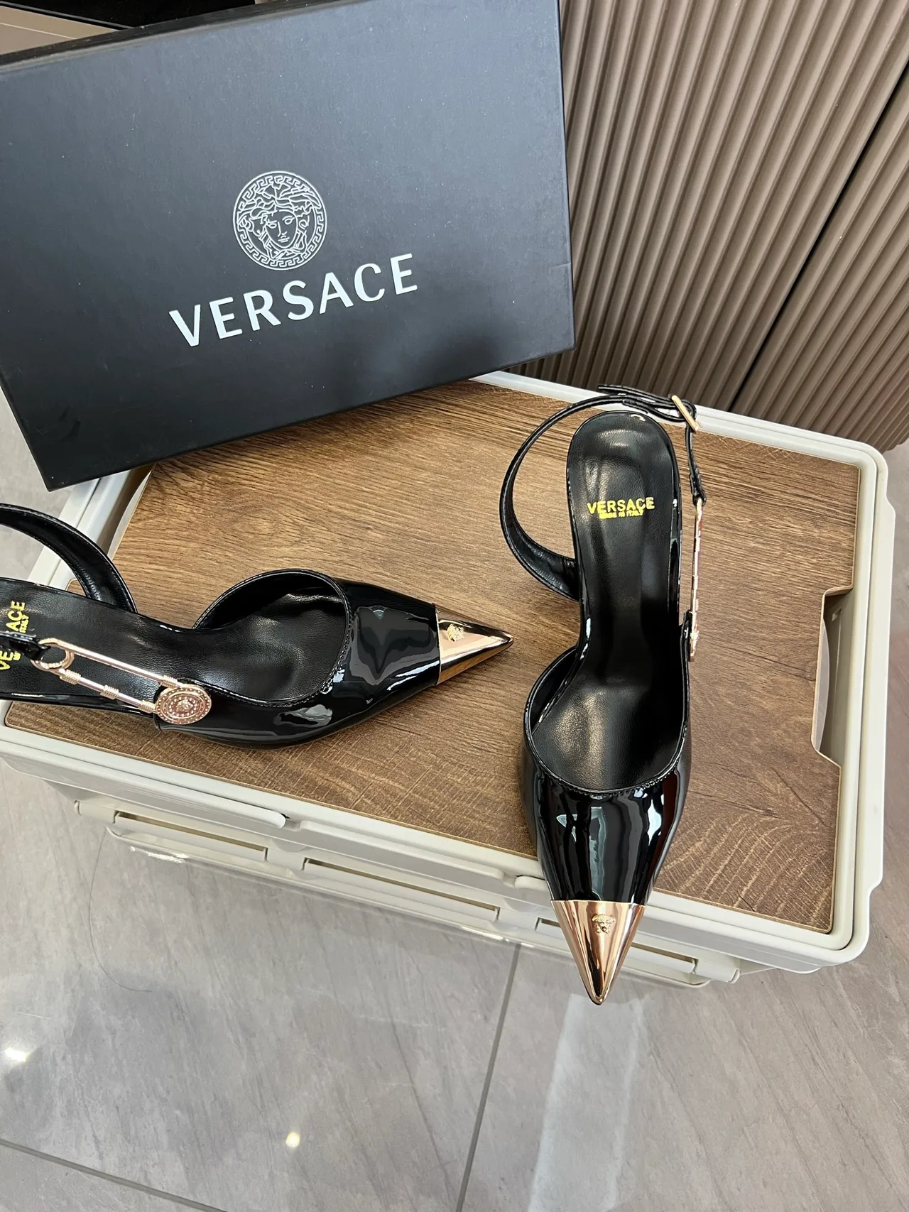 Versace Glossy Pointed-Toe Pointed Slingback Pumps in Black · view 8