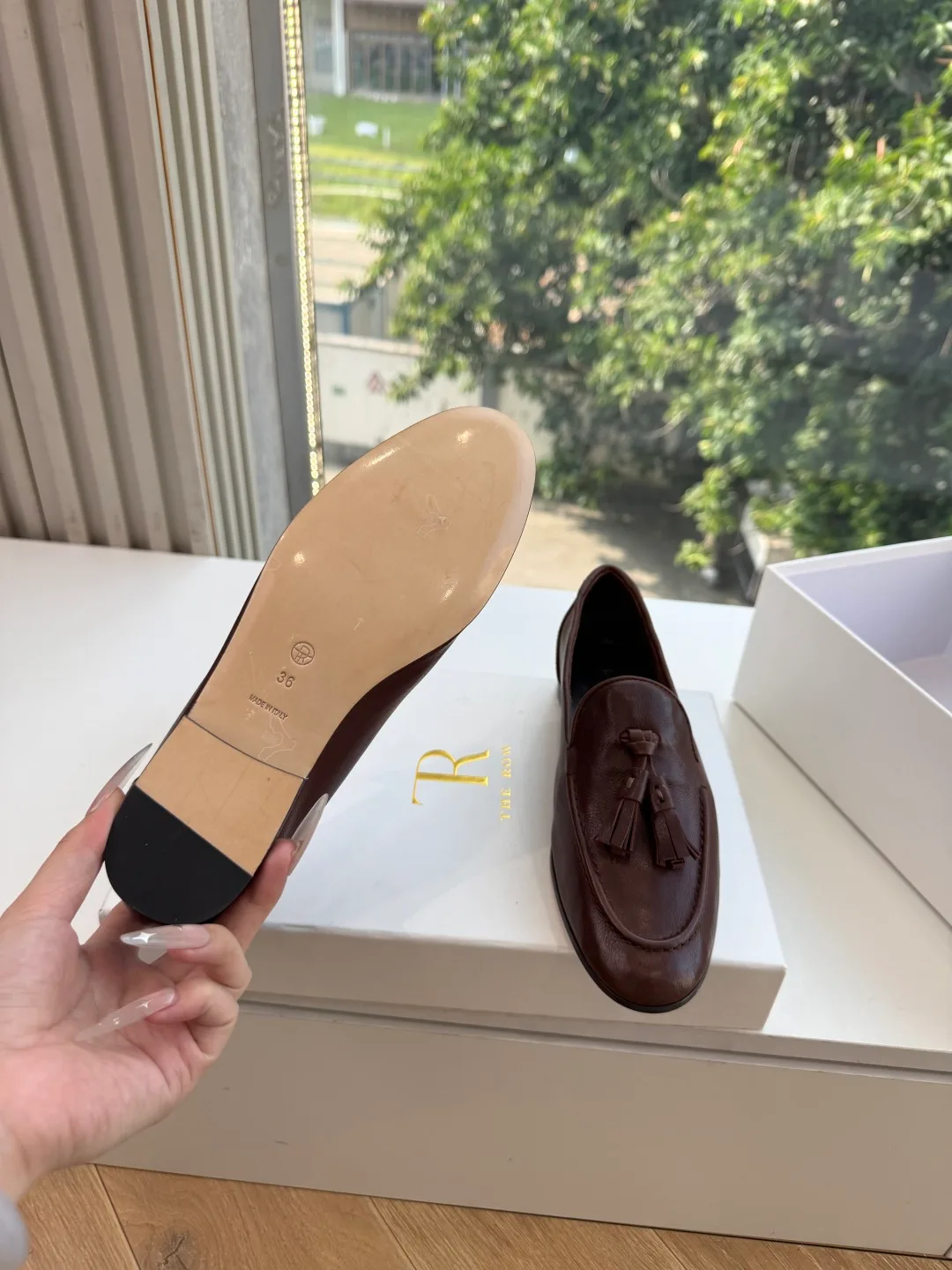 The Row Cowhide Glossy Round-Toe Tassel Loafers in Brown · view 8