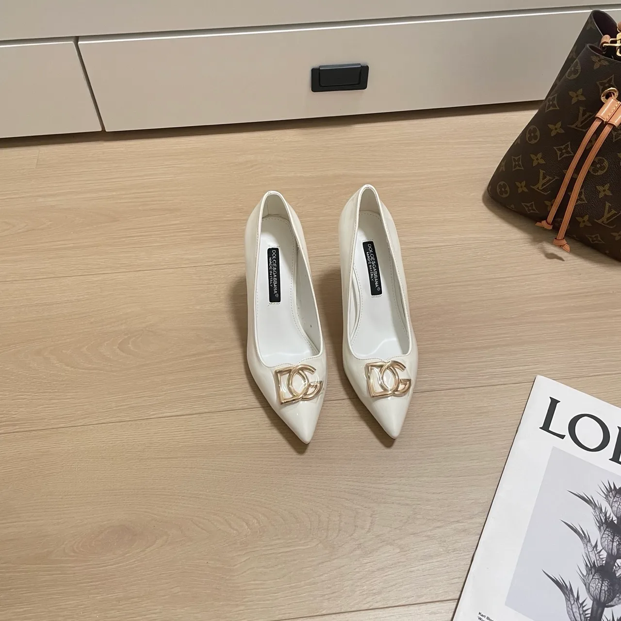 Dolce & Gabbana Sheepskin Patent Leather Glossy Pointed-Toe DG Pointed Heel Pumps in White · view 1