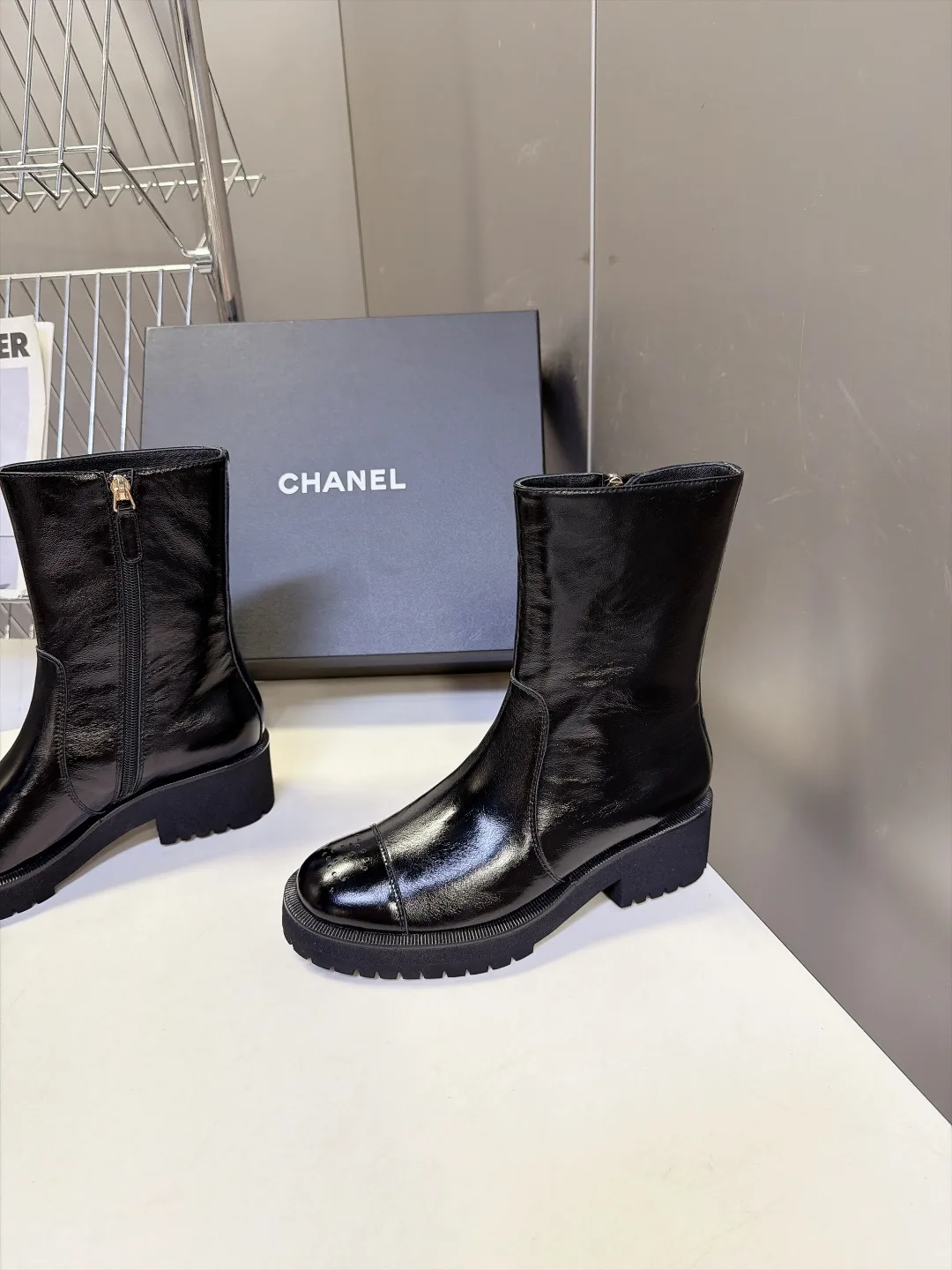 Chanel Cowhide Patent Leather Glossy Round-Toe Ankle Boots in Black · view 3