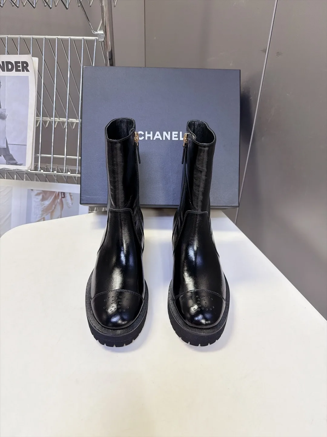 Chanel Cowhide Patent Leather Glossy Round-Toe Ankle Boots in Black · view 1