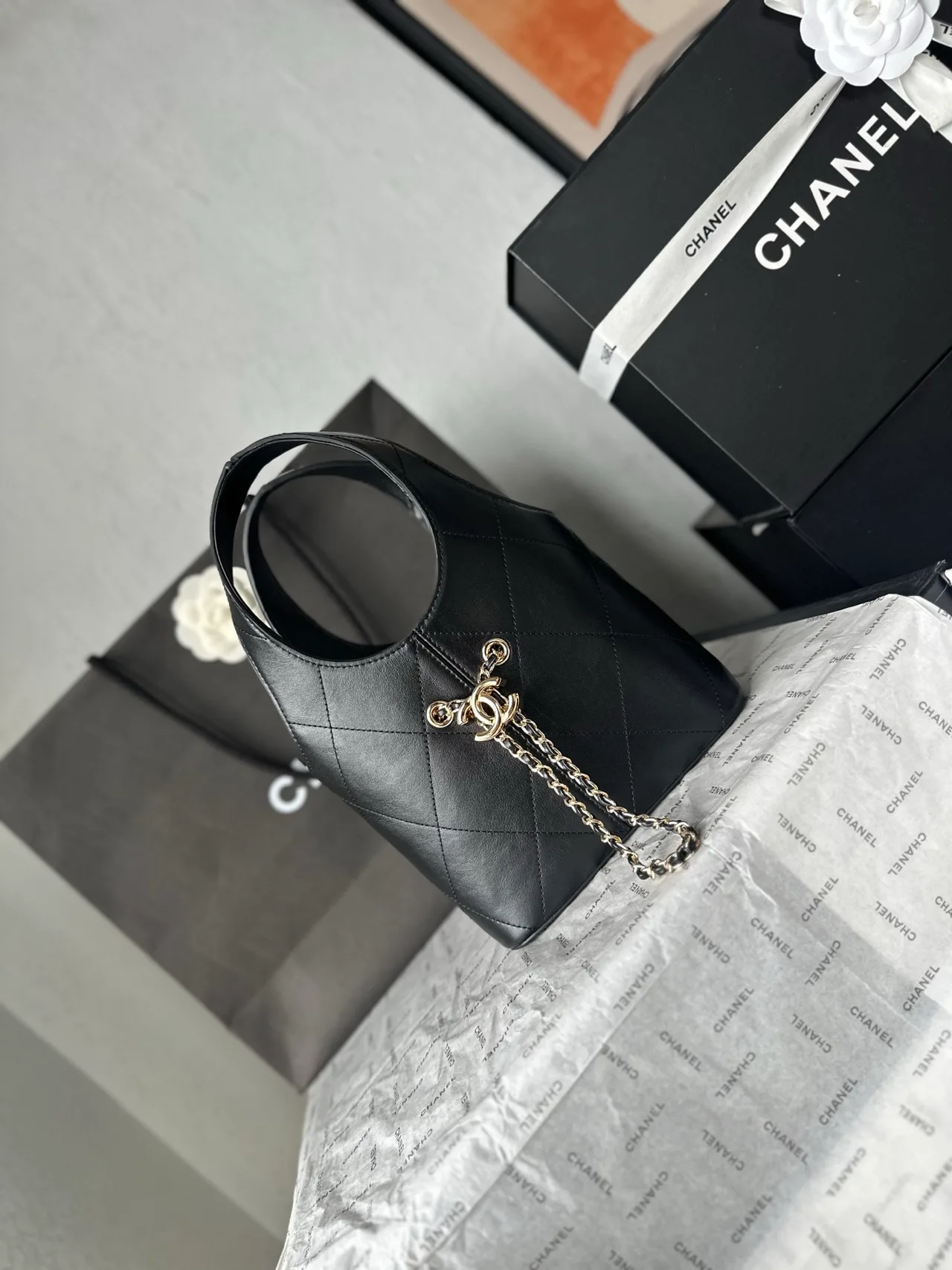 Chanel Leather Quilted Bucket Bag in Black · view 2