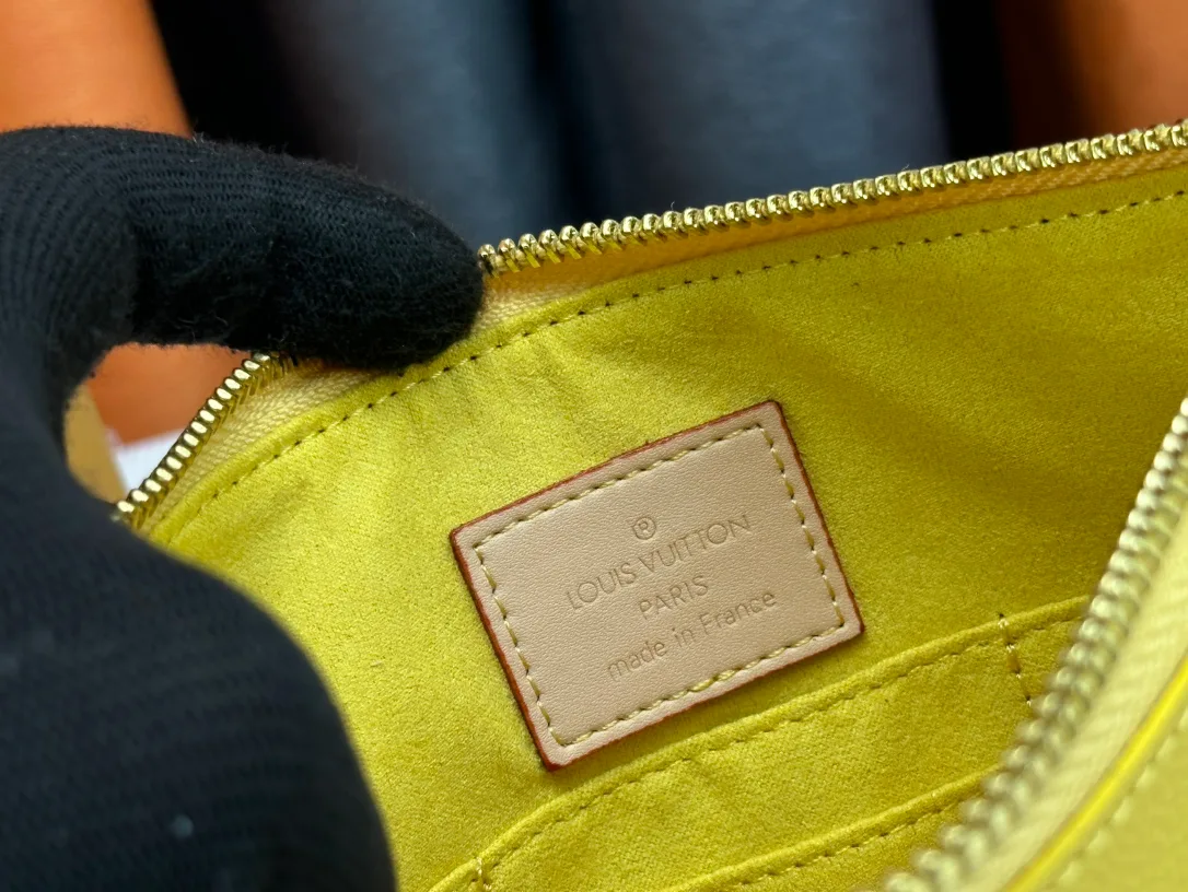 Louis Vuitton Calfskin Wristlet Pouch in Brown · view 9