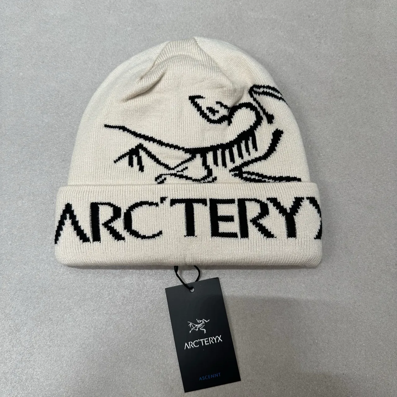 Arc'teryx Graphic knit beanie in Cream & Grey & Burgundy & Orange & Green & Pink & Yellow & Black & Blue & Beige & Tan · view 1