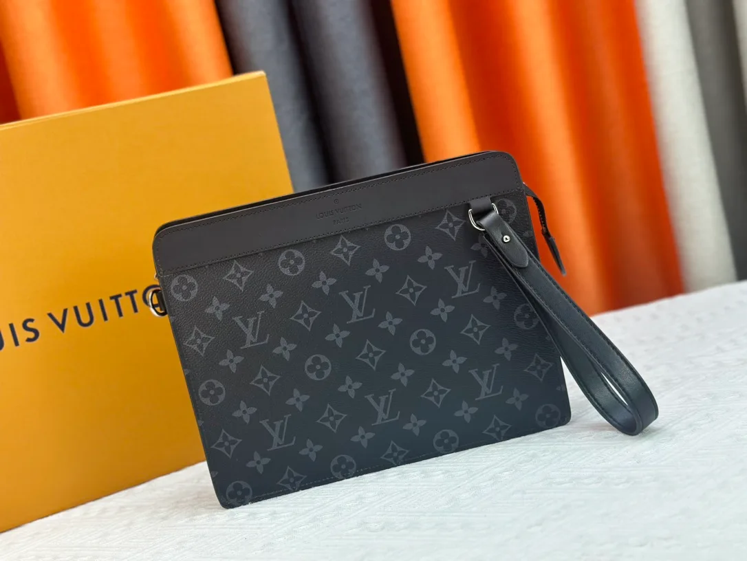 Louis Vuitton Canvas Monogram Clutch in Grey · view 1