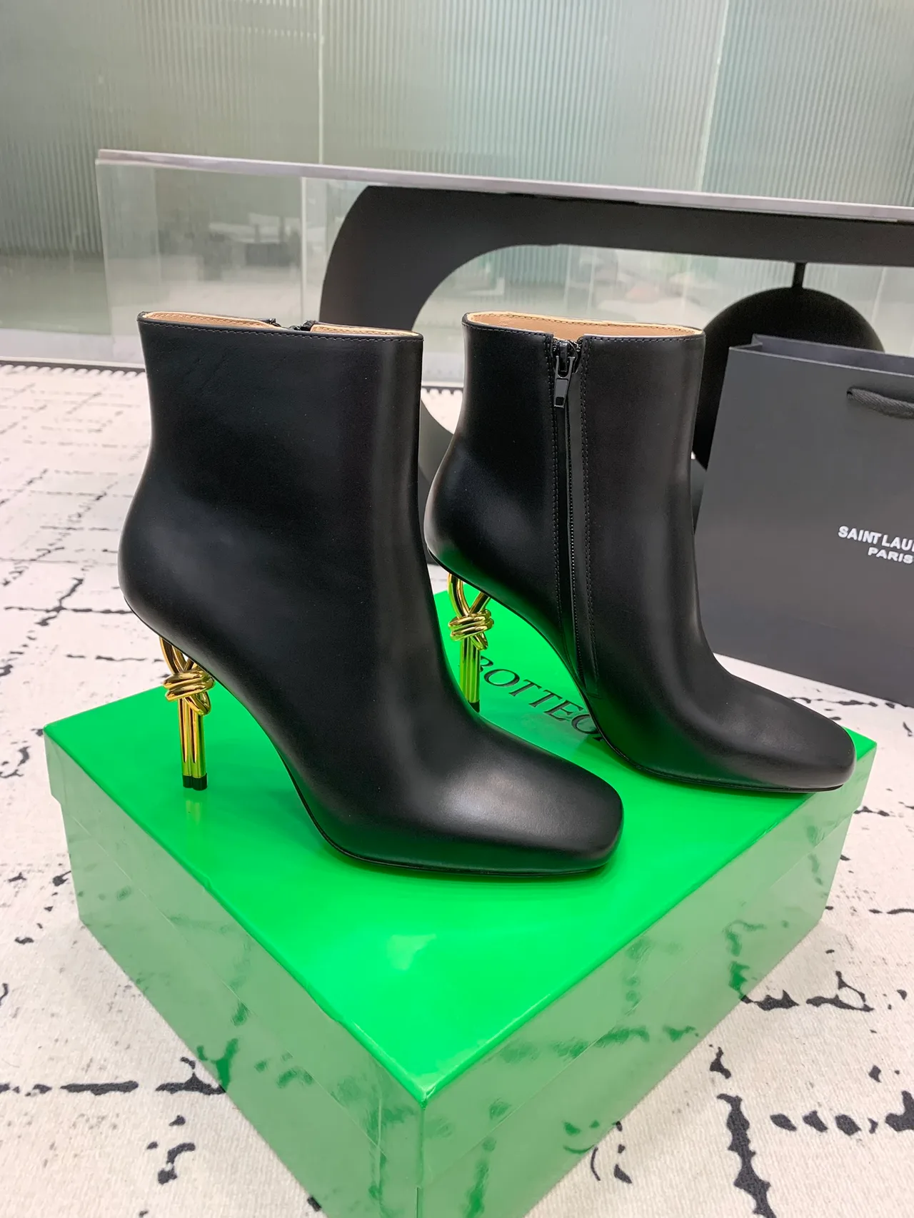 Calfskin Smooth Pointed-Toe Knot-Heel Ankle Boots in Black · view 2