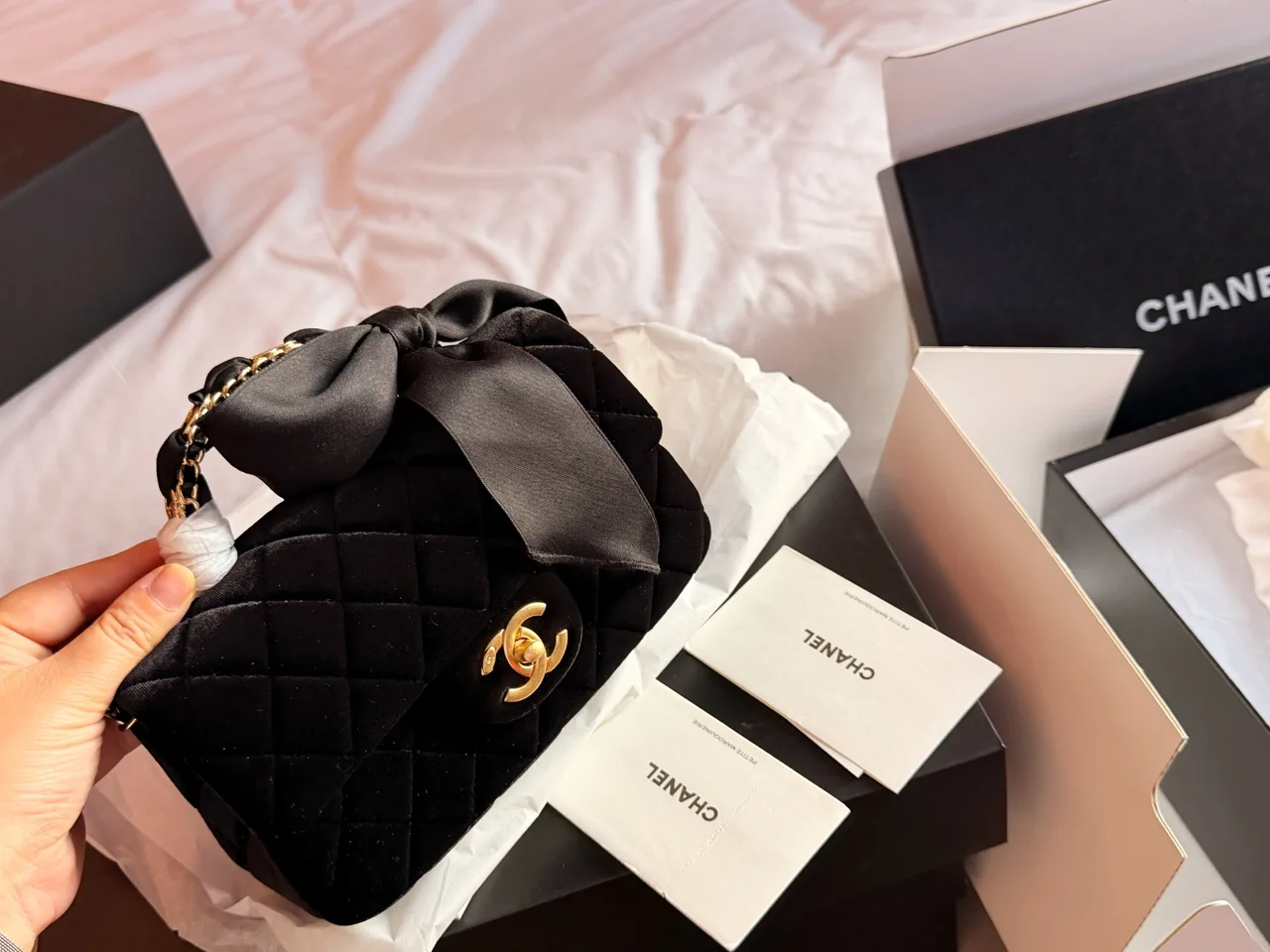 Chanel Quilted Glossy Clutch in Black · view 1
