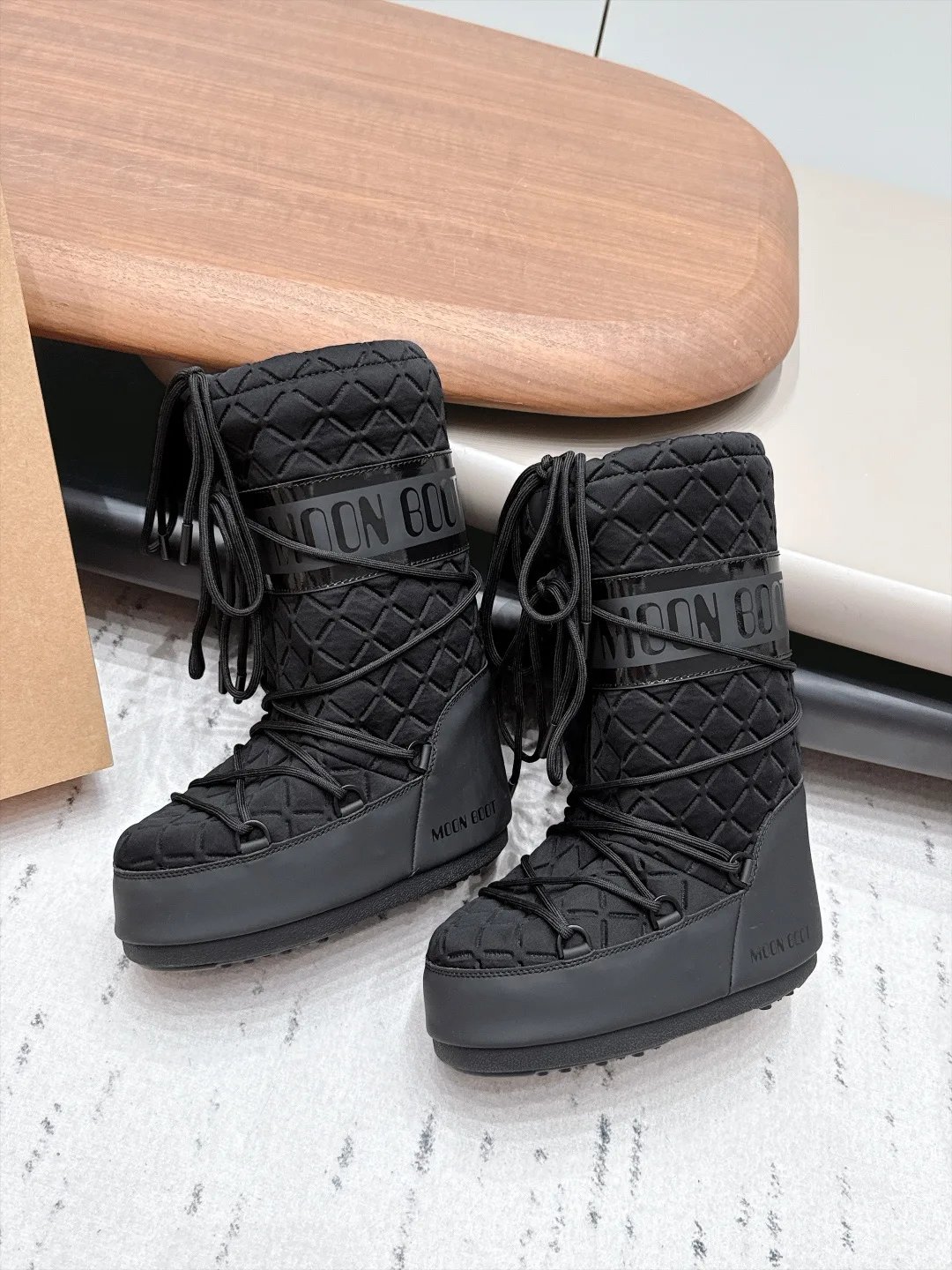 Moon Boot Glossy Quilted Snow Boots in Black · view 4