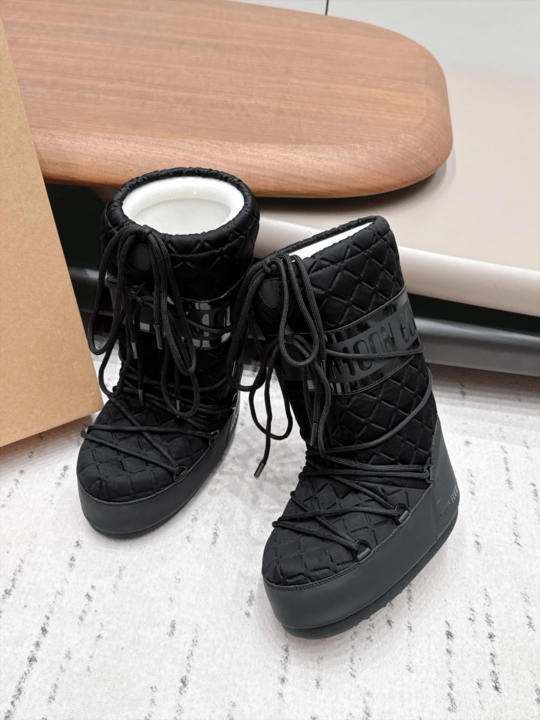 Moon Boot Glossy Quilted Snow Boots in Black · view 3