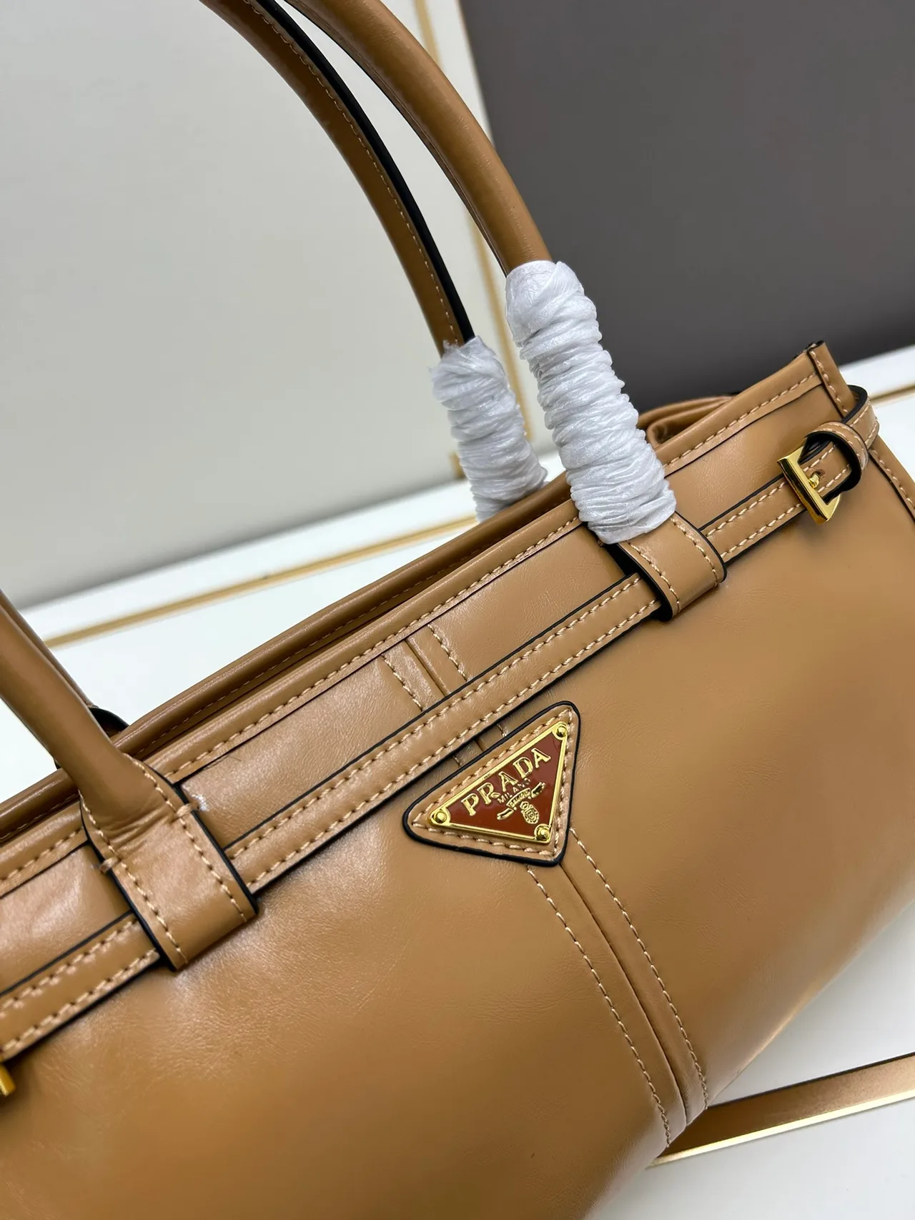 Prada Smooth Top-Handle Bag in Tan · view 5
