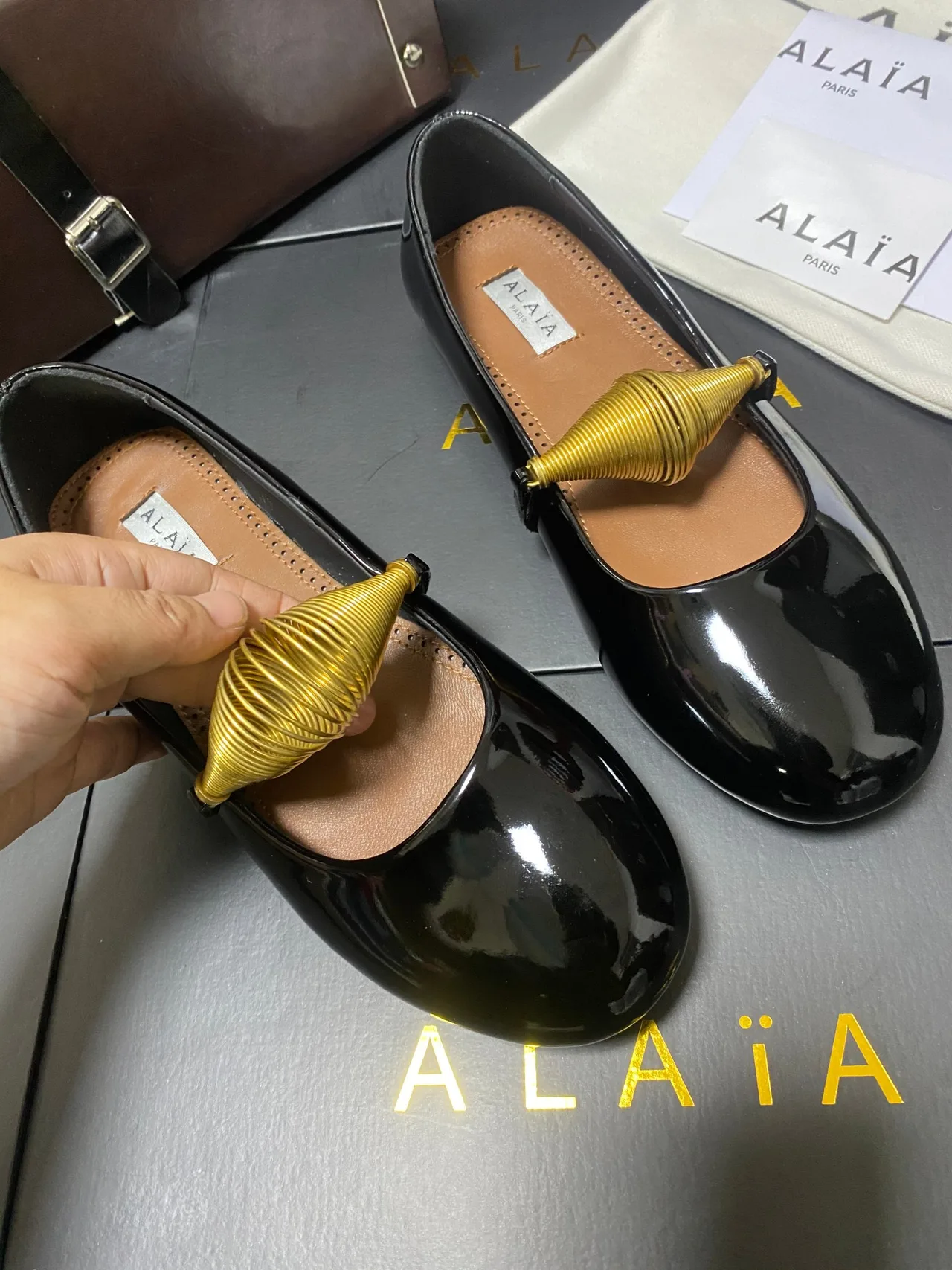 Alaia Cowhide Sheepskin Glossy Square-Toe Mary Jane Flats in Black · view 7