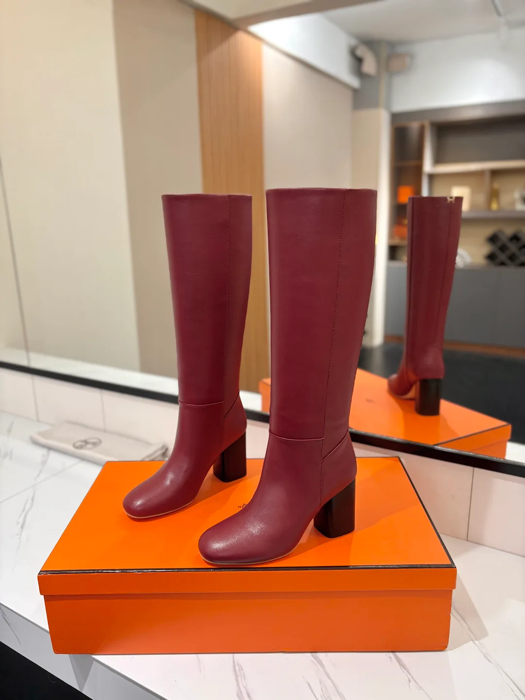 Hermes Cowhide Knee-High Boots in Burgundy · view 2