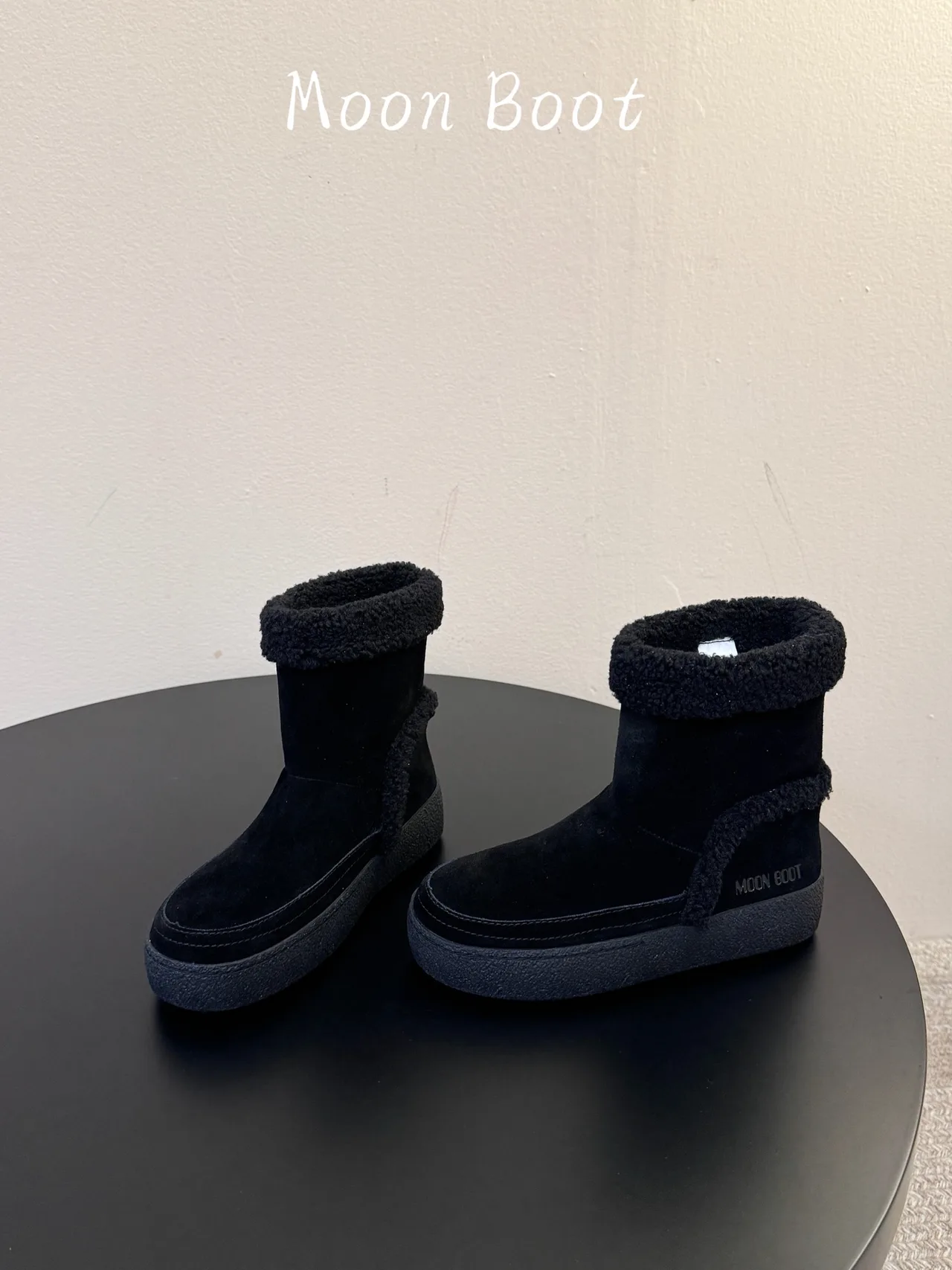 Moon Boot Cowhide Ankle Boots in Black · view 5