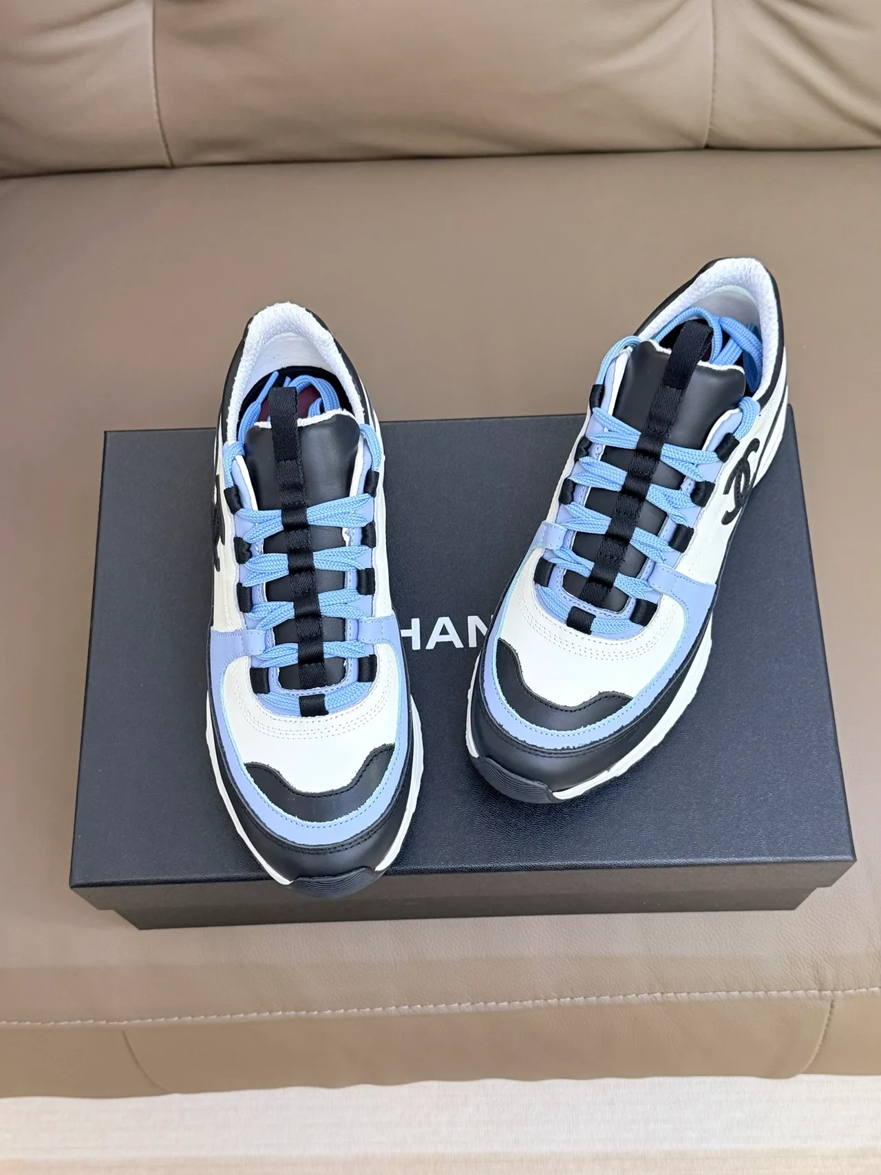 Chanel Cowhide Sheepskin Sneakers in White · view 2