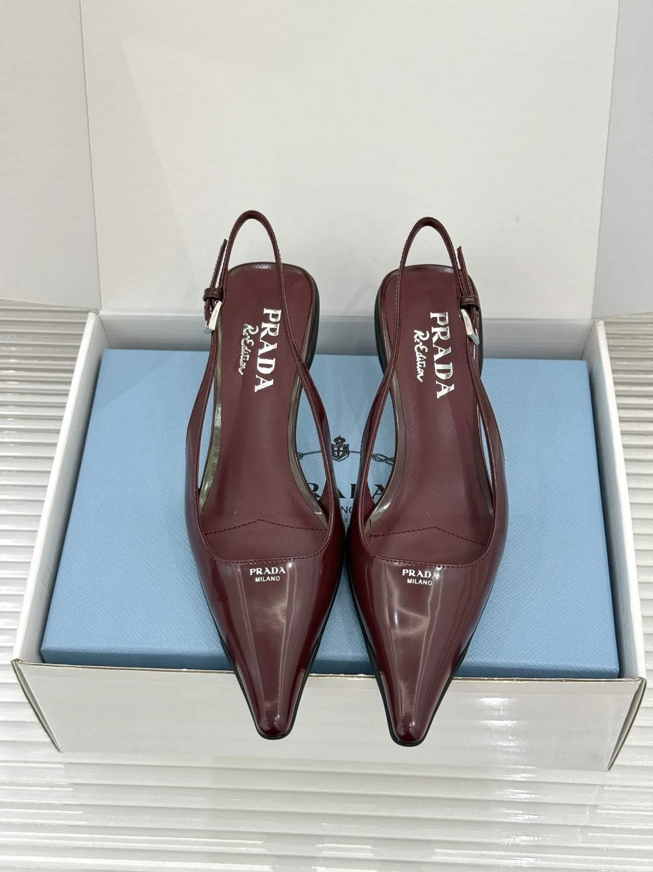 Prada Pointed Slingback Pumps in Burgundy · view 1