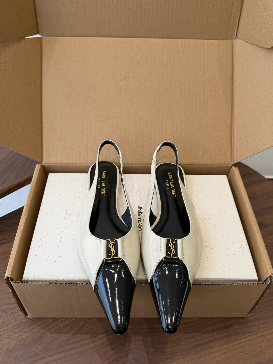 Saint Laurent Sheepskin Glossy Pointed-Toe Toe-Cap Slingback Pumps in White · view 1