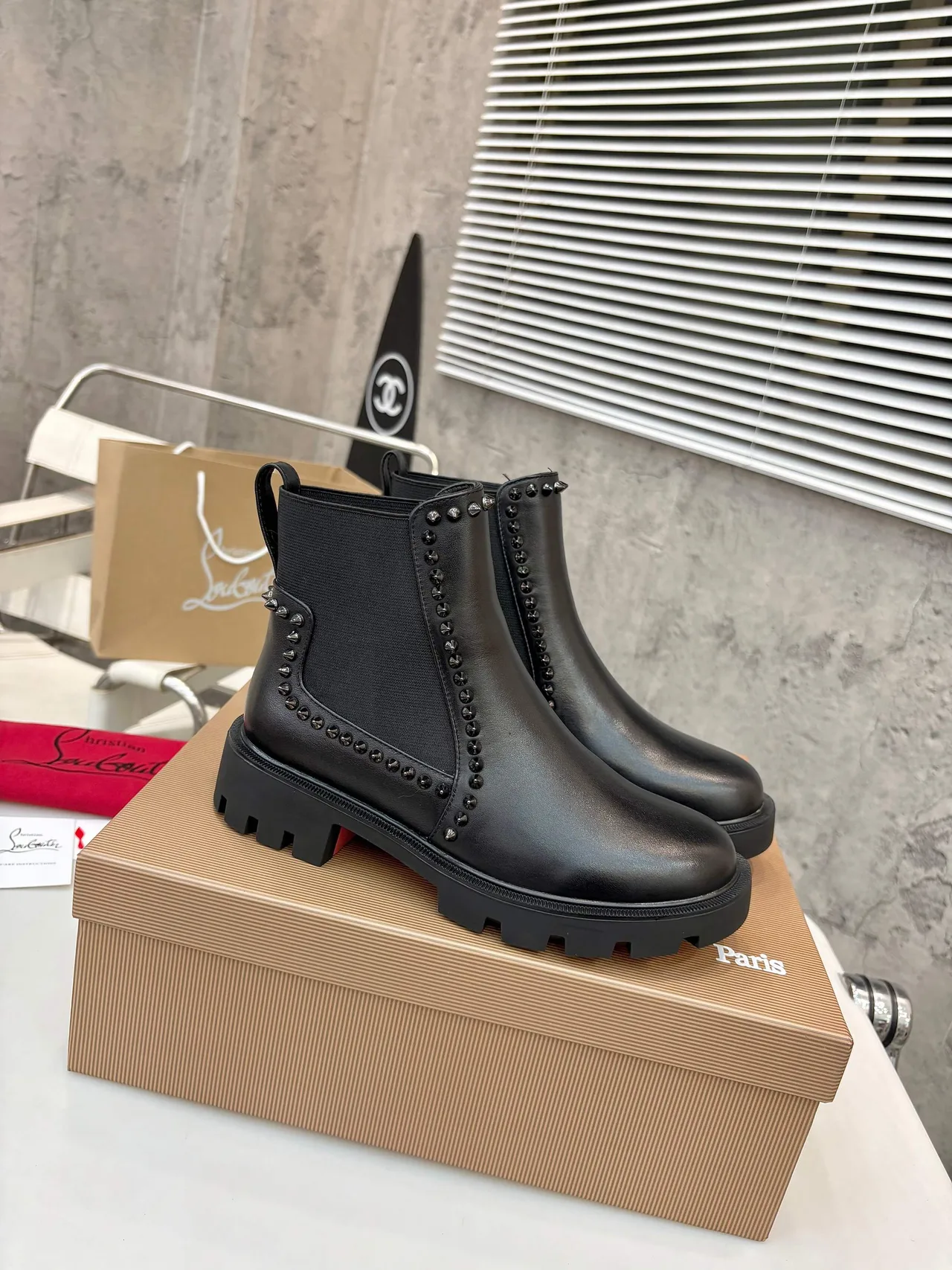 Christian Louboutin Buckle Chelsea Boots in Black & Brown · view 1