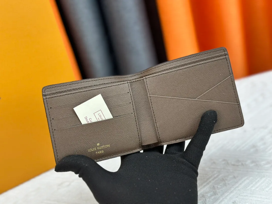 Louis Vuitton Canvas Wallet in Brown · view 3