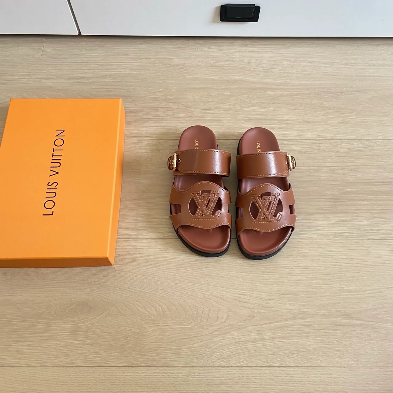 Louis Vuitton Leather Sandals in Brown · view 1