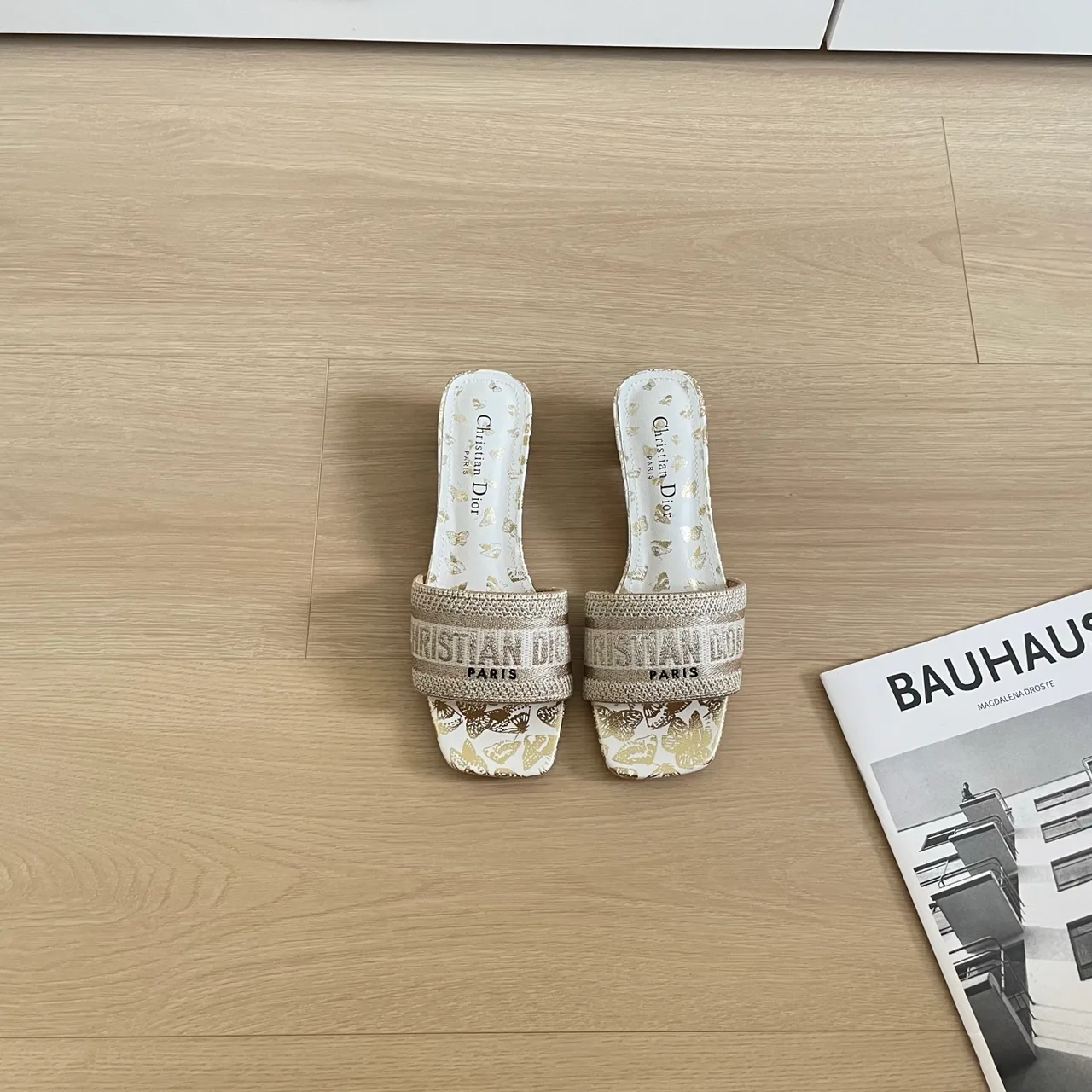 Dior Slippers in Cream · view 1