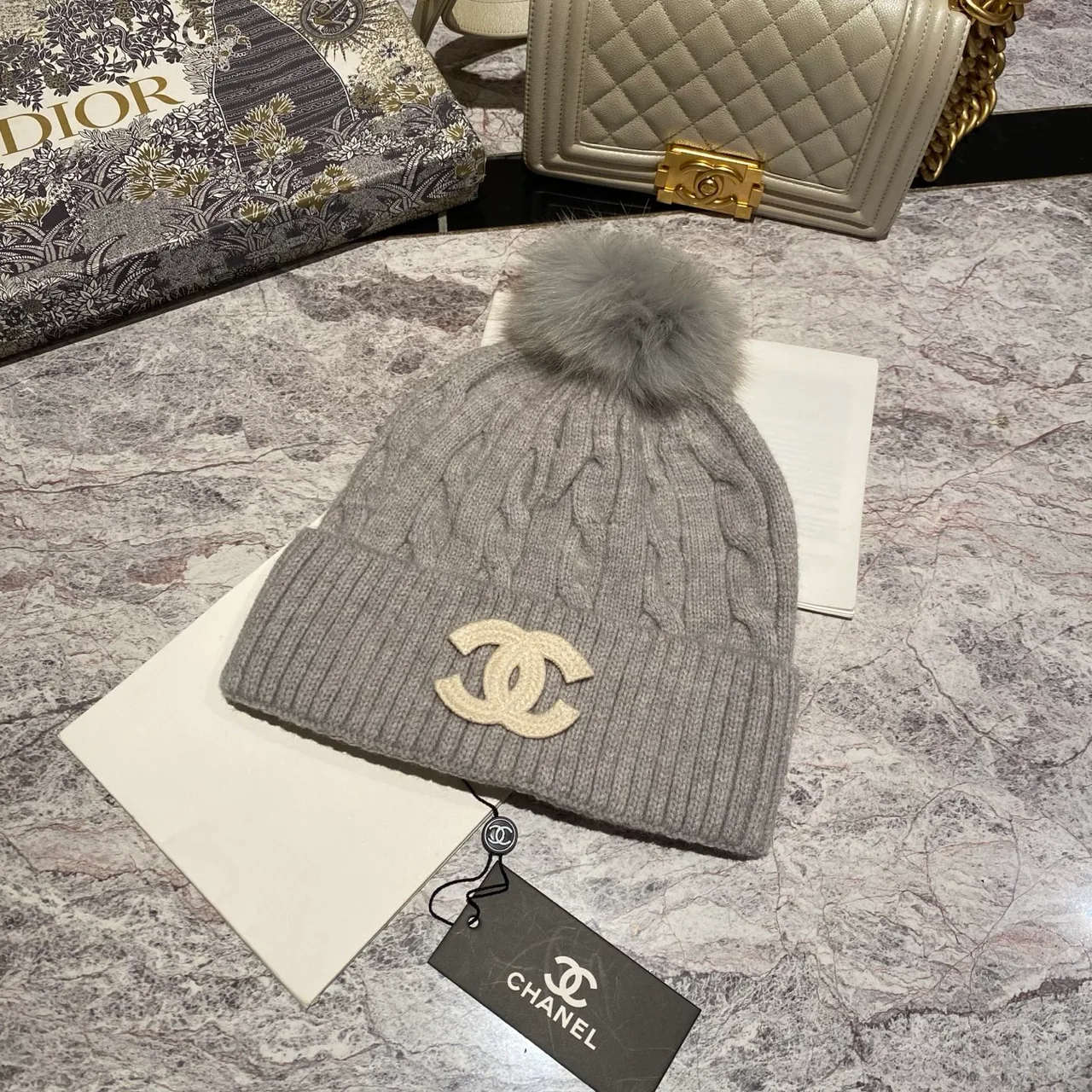 Chanel CC pom knit beanie in Blue & Burgundy & Black & White & Grey & Cream & Pink & Tan · view 5