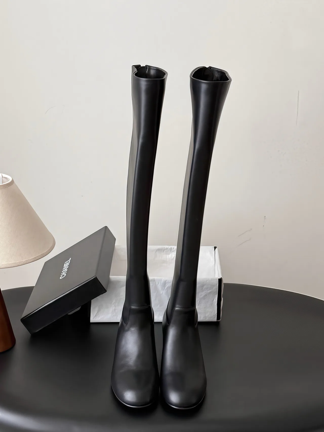 Chanel Sheepskin Boots in Black · view 1