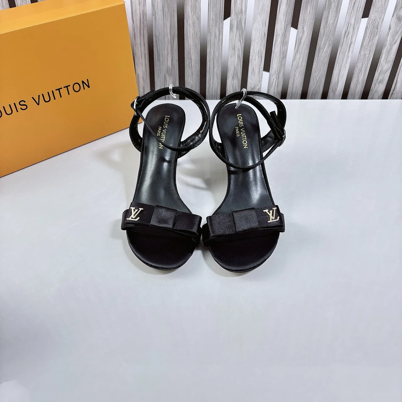 Louis Vuitton Bow Ankle-Strap Sandals in Black · view 1