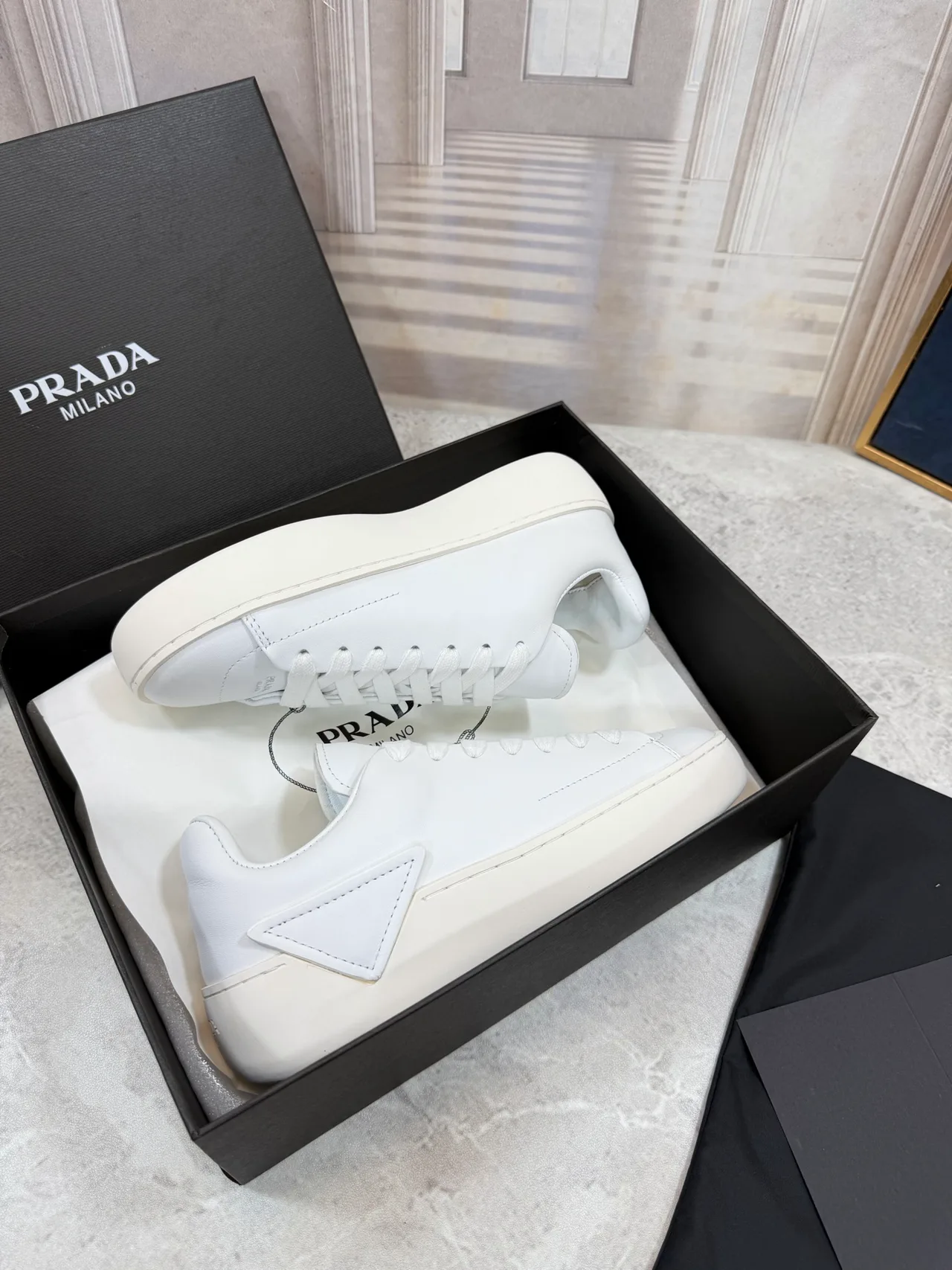 Prada Cowhide Smooth Low-Top Sneakers in White · view 3