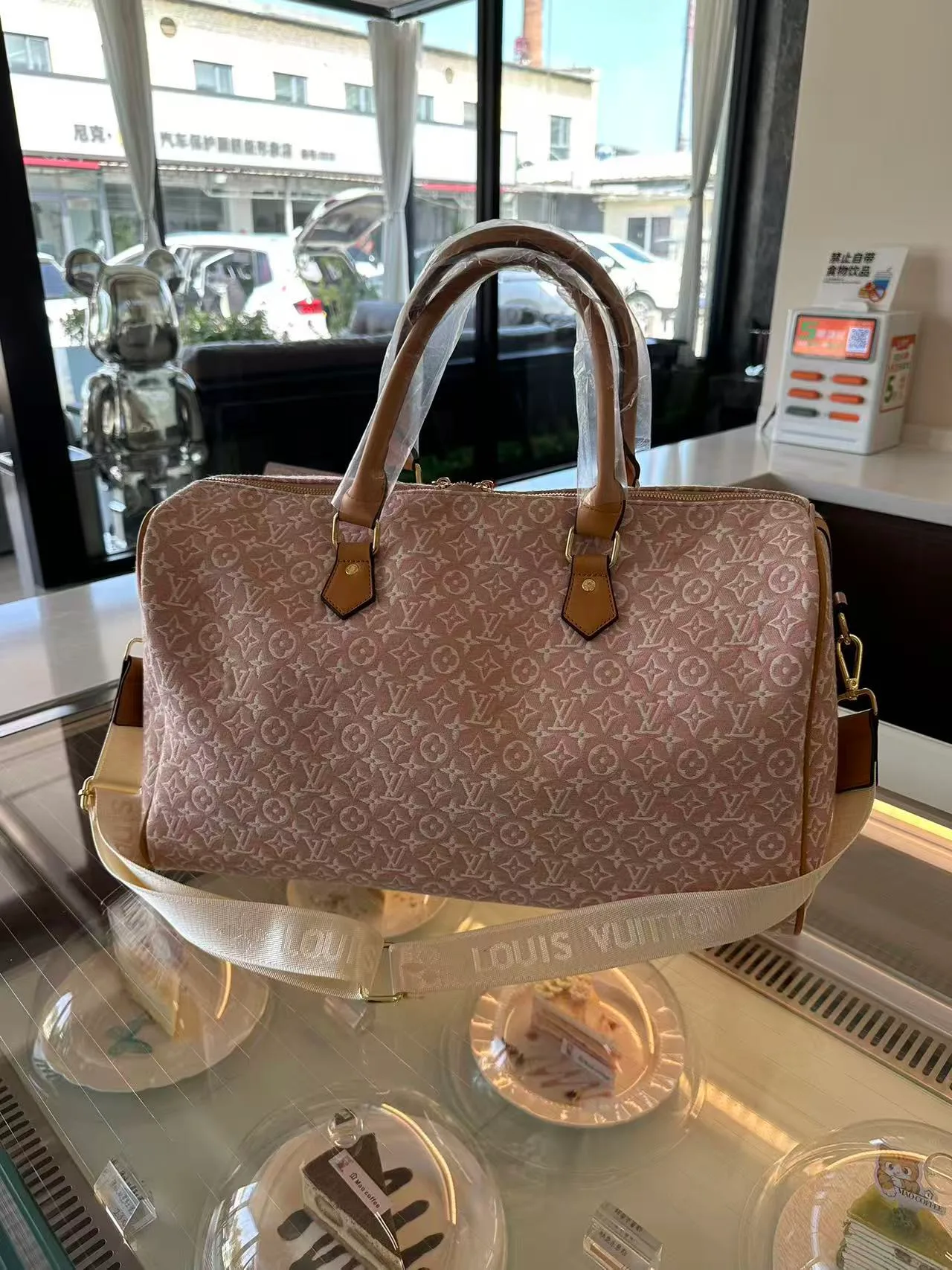 Louis Vuitton Duffel Bag in Pink · view 3