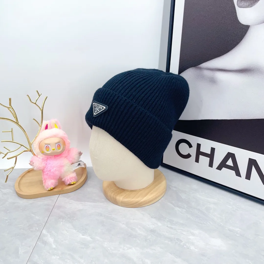 Prada Triangle-Badge Beanie in Black & Grey & White & Beige & Brown & Yellow & Blue & Pink & Red · view 7