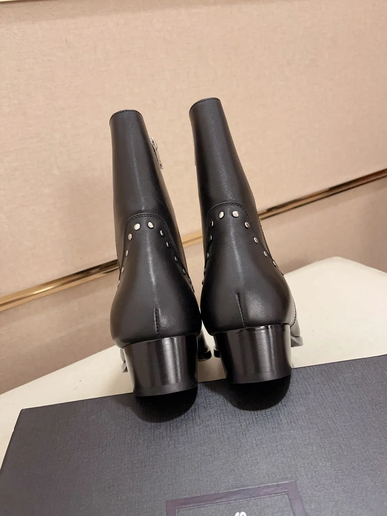 Saint Laurent Cowhide Glossy Pointed-Toe Ankle Boots in Black · view 8