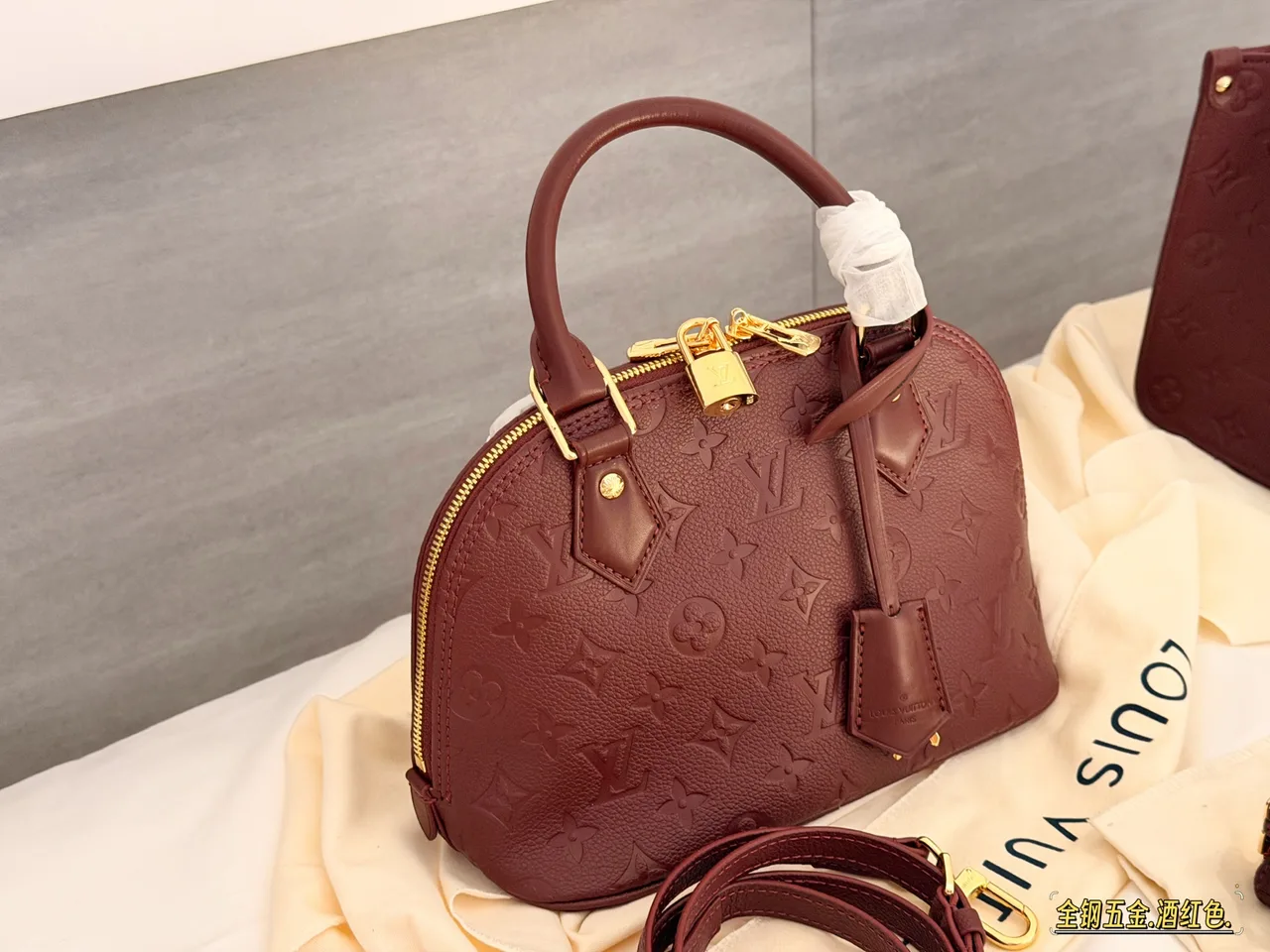 Louis Vuitton Quilted Handbag in Burgundy · view 2