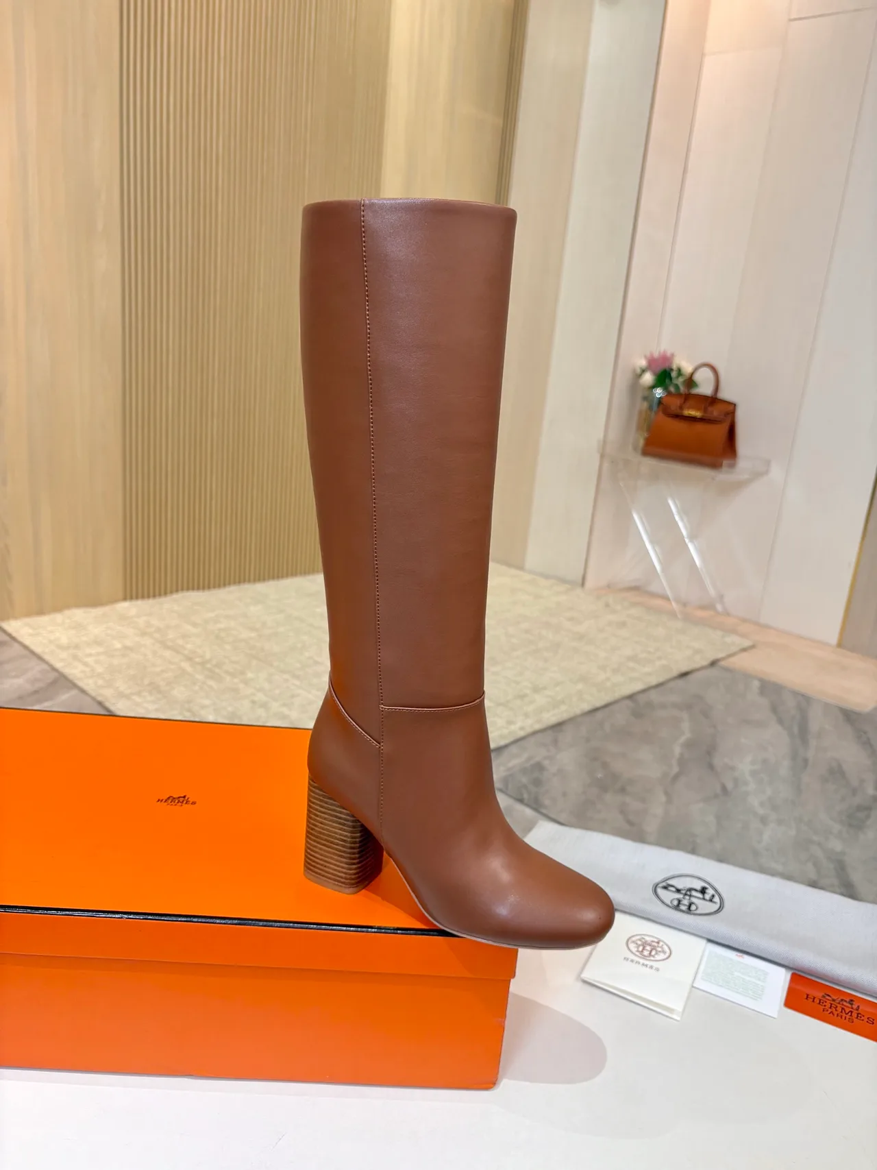 Hermes Cowhide Boots in Brown · view 1