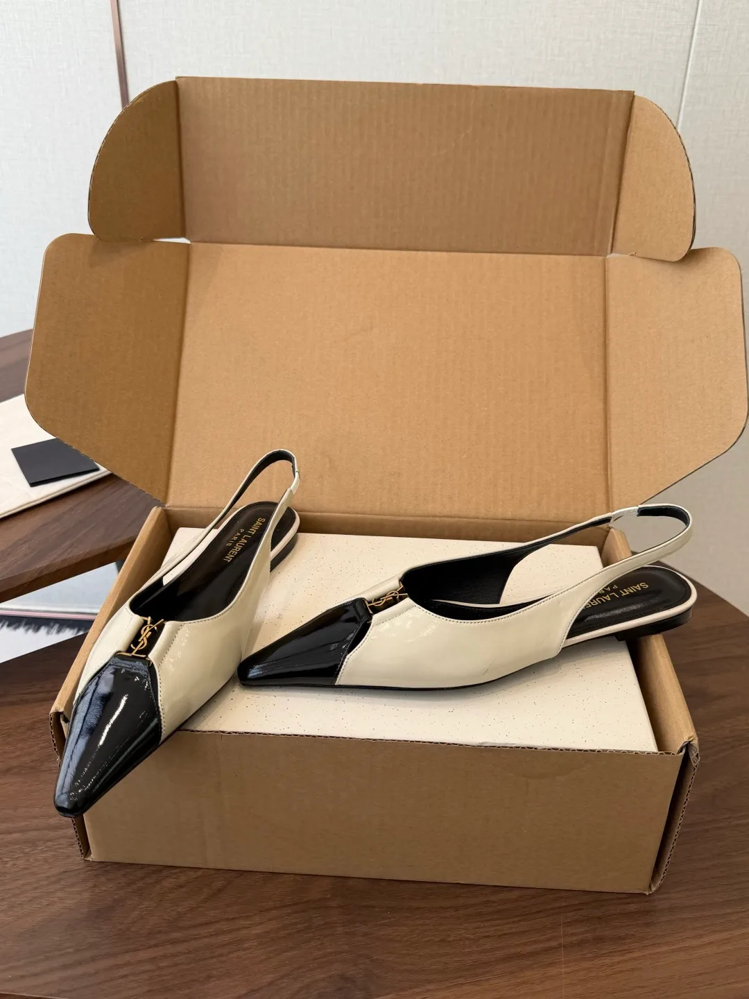 Saint Laurent Sheepskin Glossy Pointed-Toe Toe-Cap Slingback Pumps in White · view 3