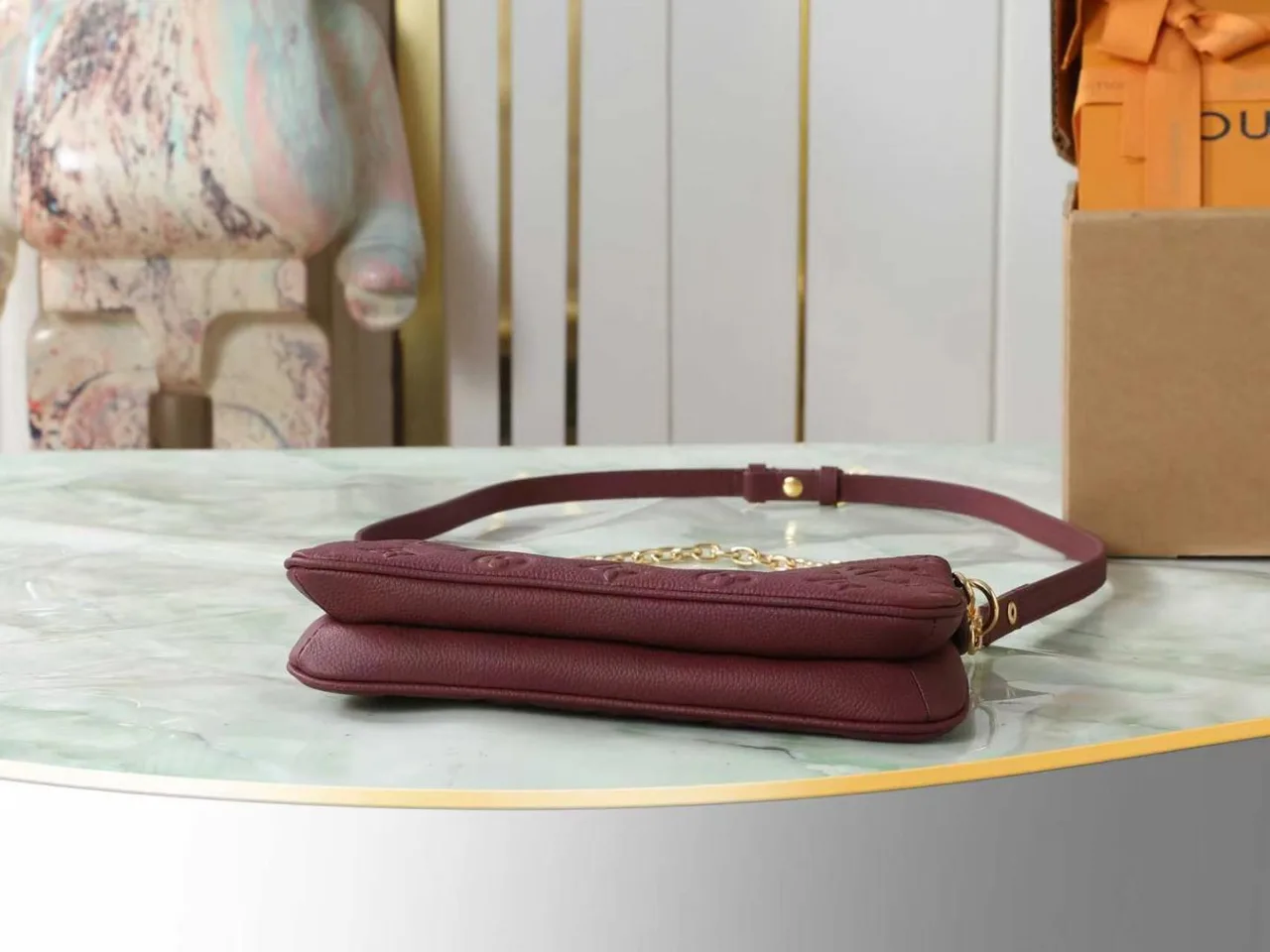 Louis Vuitton Leather Quilted Clutch in Burgundy · view 4