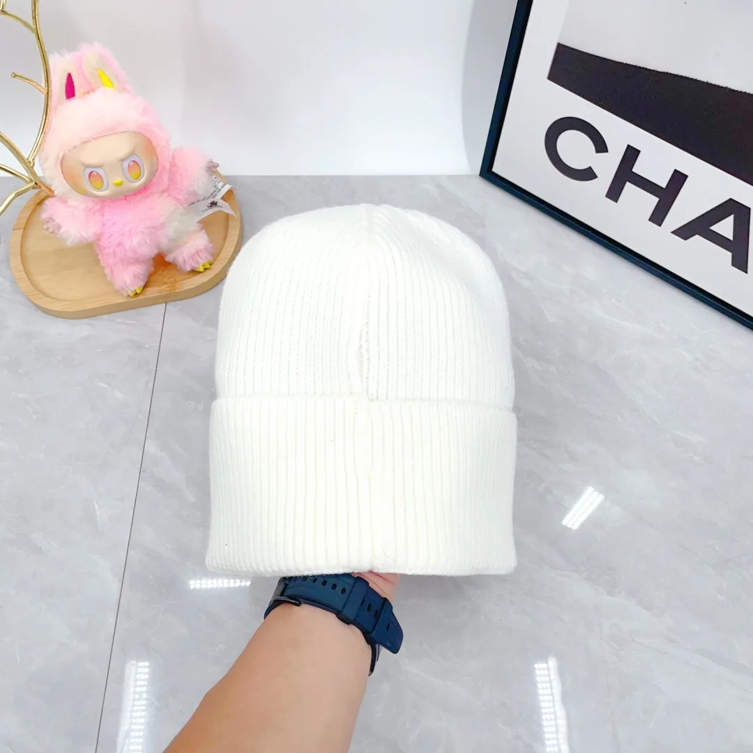 Prada Wool Triangle Logo Knit Beanie in White · view 6