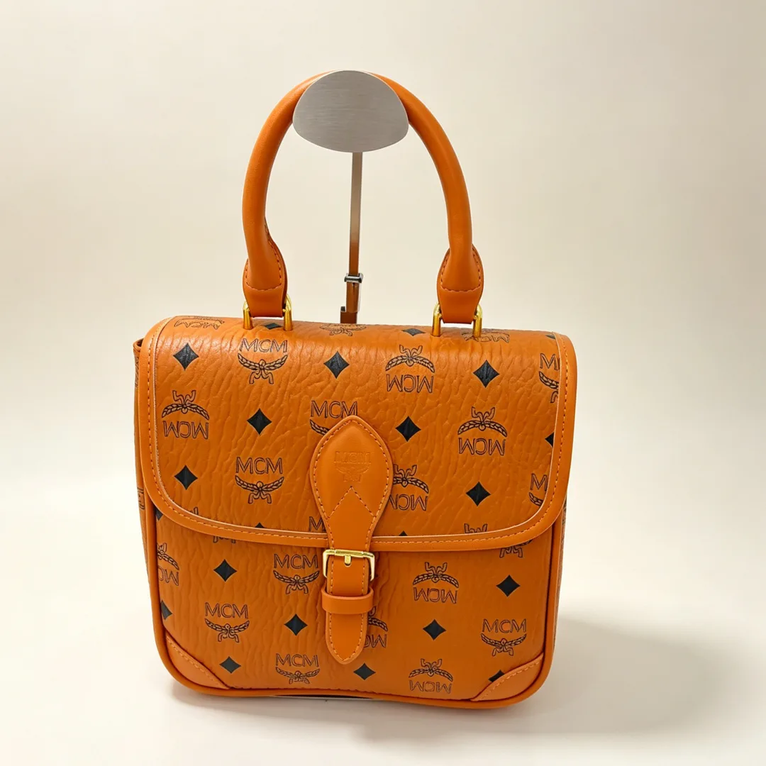 Louis Vuitton Mini Saumur Bag in Brown & Black & Blue & Orange · view 5